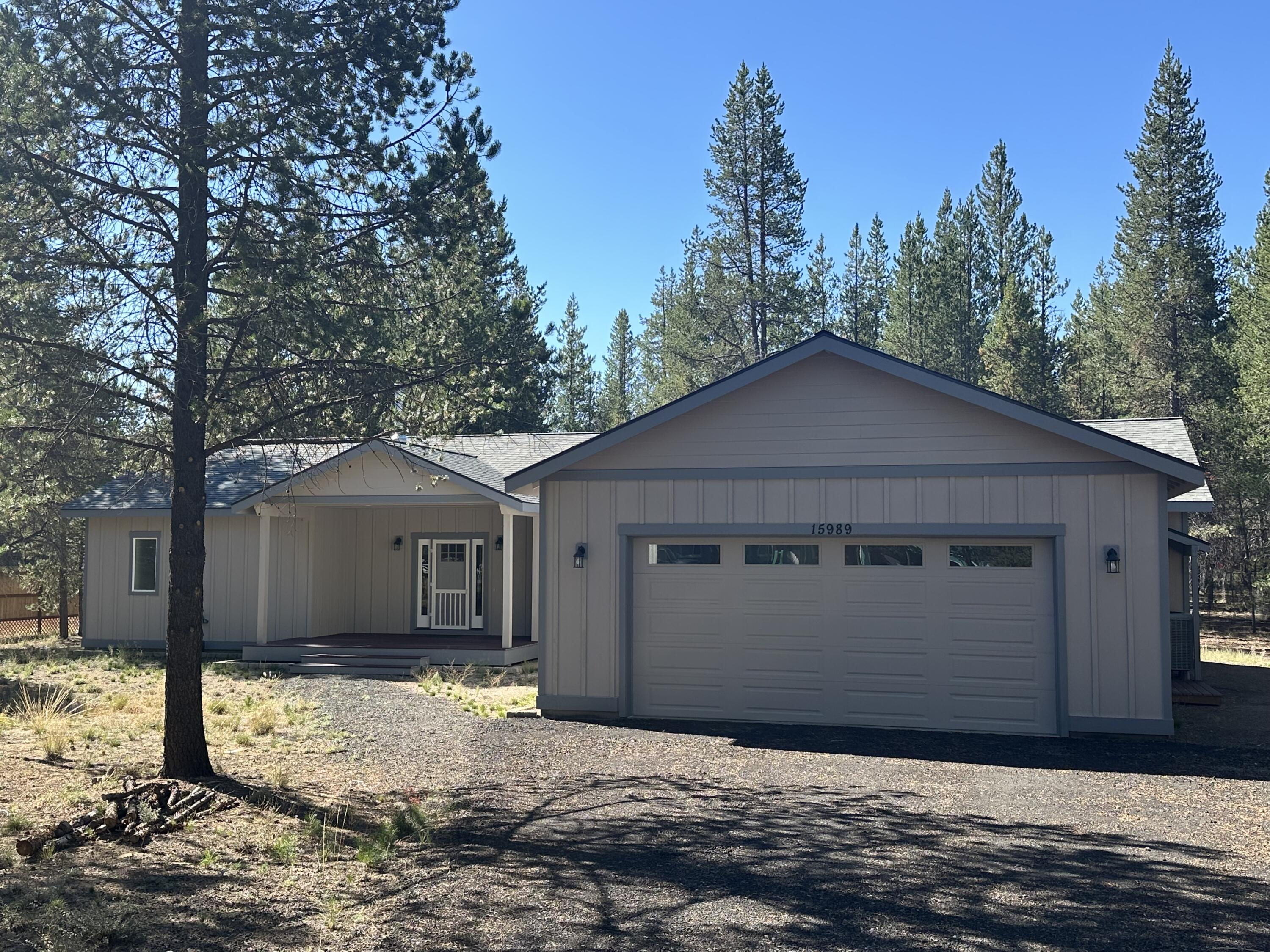 Major Price Reduction! Builder says get this one sold! Lightly lived-in, well-built single-level home on a full acre. Step inside from the covered front porch into a spacious great room featuring a cozy woodstove, ceiling fan, and access to a covered back patio. The open kitchen offers quartz counters, stainless steel appliances, and plenty of cabinetry. Excellent bedroom separation. The primary suite includes a tile walk-in shower, soaking tub, ceiling fan, and a generous closet. 3 bedrooms plus a full-size office. Oversized garage, re-circulating hot water with timer, hybrid water heater, and heat pump for year-round energy efficiency. Come home to La Pine and enjoy endless outdoor adventure right outside your door.