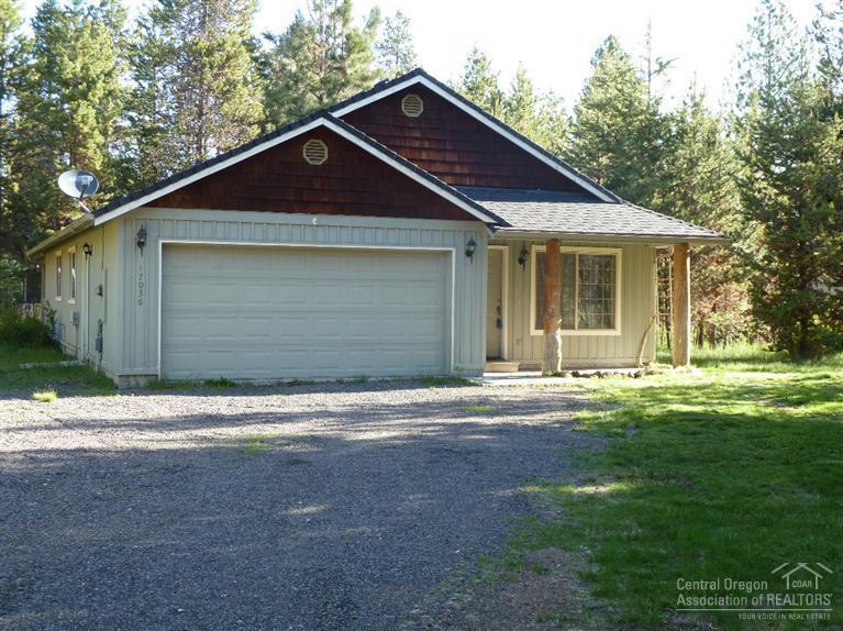 Very cute 3 bedroom 2 bath with double attached garage. New interior paint and freshly shampooed carpet! Boat ramp, park, and clubhouse just down the road! Lovely treed .5 acre lot and mostly fenced.