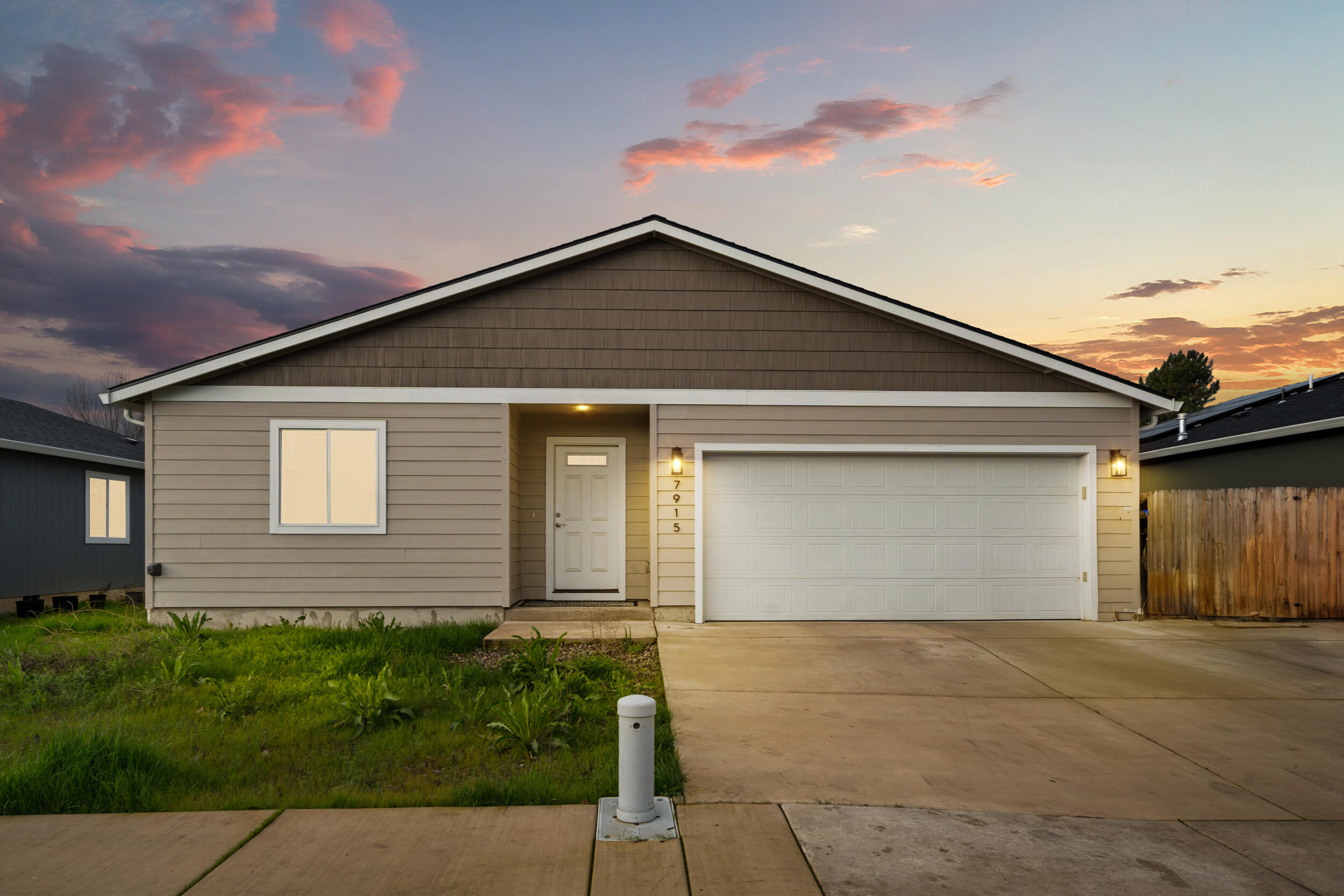 Welcome to 7915 Jacqueline Way in the Arbor Gate subdivision of White City! This newer construction home offers 3 bedrooms, 2 bathrooms, and 1,240 sq ft of well-designed living space. Enjoy spacious bedrooms and an open concept layout perfect for everyday living and entertaining. The modern kitchen features a beautiful butcher block island, gas stove, and ample cabinetry, flowing seamlessly into the living and dining areas. The home also includes a finished 2-car garage for added convenience and storage. Landscaping has not yet been completed, giving the buyer a great opportunity to design an outdoor space that fits their own vision. Conveniently located near parks and schools, this home combines comfort, style, and location - don't miss your chance to make it your own!