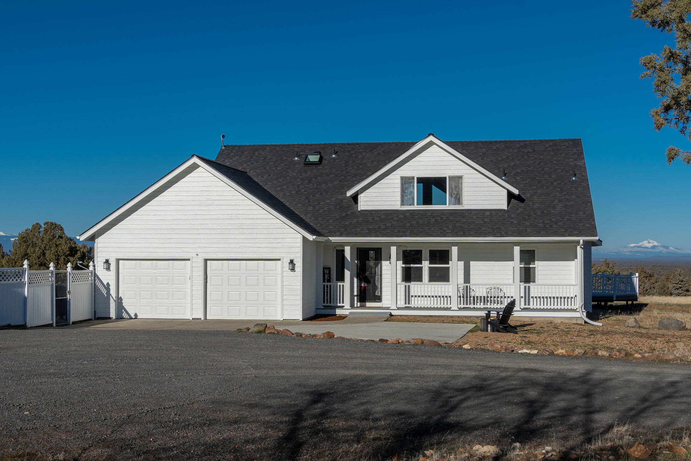 Impeccably maintained family home with world class views of the entire Cascade Mountain Range & Smith Rock. Newly updated 2 story home on nearly 10 acres! Fantastic open floor plan w/ vaulted ceilings is superb for entertaining. Primary bedroom located on the main level with en-suite bath featuring dual sinks & solid surface counters. Other highlights: upgraded chef's kitchen (granite counters, custom cabinets, Thermador oven/range), main level office/ 4th bedroom, large, open to below bonus room upstairs,  enormous deer resistant vegetable garden (auto drip), huge steel-framed shop (56' X 50' w/ office) to house multiple toys/RVs along with extensive craftsman area. Plus well built 5 stall, drive-thru barn (44' X 36') for horses/livestock projects for future generations. Equipped w/ heat pump AC, premium well, & recently pumped septic system.  Property fenced & cross-fenced. Make it yours today!