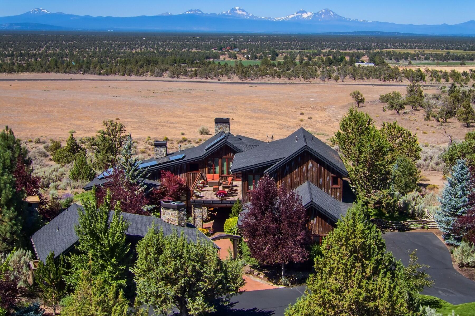 Cascade Mountain Views from beautiful NW style home constructed from reclaimed barn wood. The courtyard is a private oasis with salt water stream, waterfall, stone fireplace and mature landscaping offers a private oasis. This custom home has rustic elegance with a blend of reclaimed wood, stone and natural features capturing the beautiful views. The home is 4607 sq ft 3 bed, 3.5 bathrooms, open floor plan and vaulted ceilings. The gourmet kitchen with stone countertops, island, breakfast bar and butler's pantry is chef's dream. The home includes large dining area, outdoor kitchen, primary suite on main floor with soaking tub, loft/flex room, 2 guest bedroom suites, utility room, 4 car garage. Casita is 820 sq ft, 1 bed, 1 bath, kitchen, living room. Enjoy all the amenities: Athletic Center, 3 Pools, Water Slide/Lazy River, Playground, Equestrian Center, 18 Hole Award Winning Golf Course, Spa Brasada, Member Club Room, Restaurants, Hiking, Biking, Fishing, Horse Back Riding.