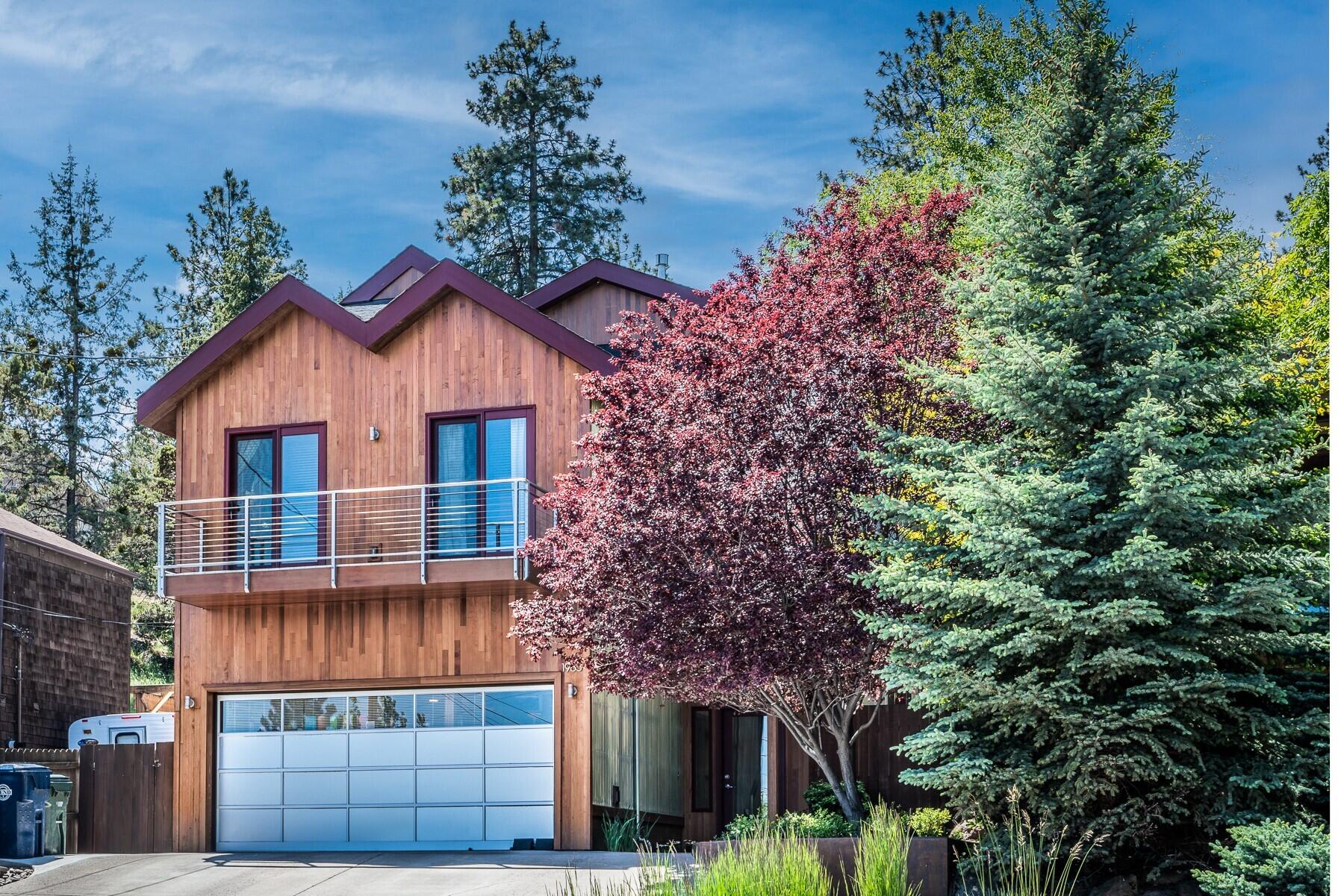 Welcome to 1985 NW Awbrey Road – this meticulously built custom home is nestled on a hill on Awbrey Butte, yet close to downtown.  The open-concept home flows beautifully into the kitchen, dining and living room. Gather and entertain in the gourmet kitchen with Stainless Steel Bosch & Jenn Air appliances; quartz countertops & custom cabinetry. Enjoy the spacious owners suite, with an attached deck overlooking the peaceful backyard. Relax in the spa-like primary bathroom which includes an air soaker tub and tiled shower. Secondary bedrooms & bathroom provide great comfort and privacy. The modern industrial railing ties in nicely with the beautiful hardwood floors throughout. You will love relaxing or entertaining in the well thought out, multi-purpose backyard. Enjoy easterly views, sunrises & fireworks on the 4th of July!  Close to many amenities, the river and parks!  Home currently has a short-term rental permit.  Buyer to do due diligence.