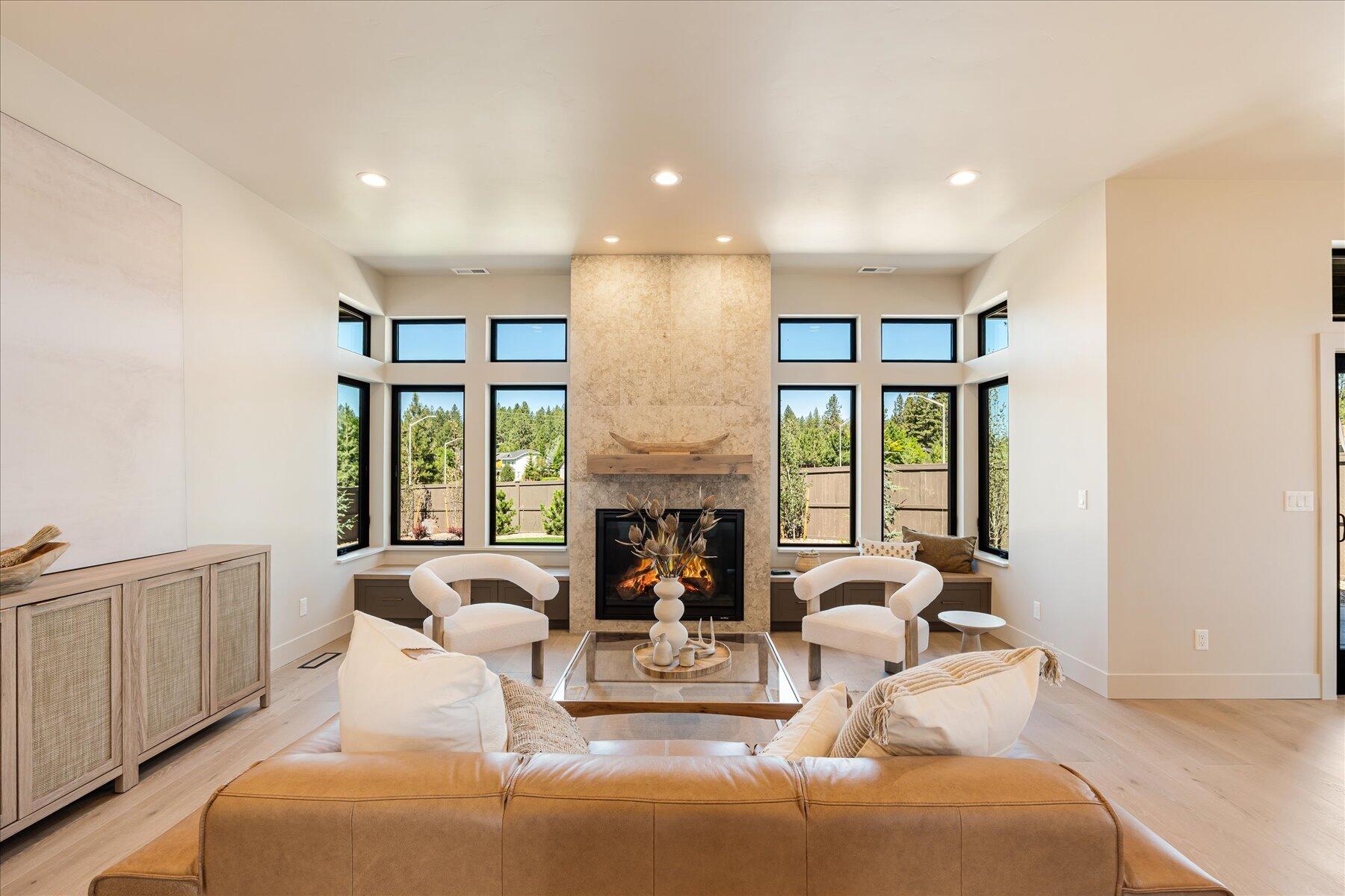 This Prairie-style home by MCD Homes features clean horizontal lines & wide overhangs that define the exterior, while inside, the open-concept layout is designed for modern comfort. A chef's kitchen with JennAir appliances, floor-to-ceiling custom cabinetry, and wide-plank hardwoods anchors the main level. Casement windows bring in soft natural light, & the main-level primary suite opens to a private patio with western exposure—perfect for sunset views on this .23-acre lot. Upstairs, 2 additional bedrooms & a flex space offer room to work, play, or host. Throughout, MCD's signature finishes and craftsmanship set the tone for elevated everyday living. Designed to be in the 2025 COBA Tour of Homes, Lot 4 includes an upgraded backyard design & 10' garage doors, & showcases the best of modern design and CO lifestyle—just minutes from Shevlin Park, Northwest Crossing, & endless trails.
