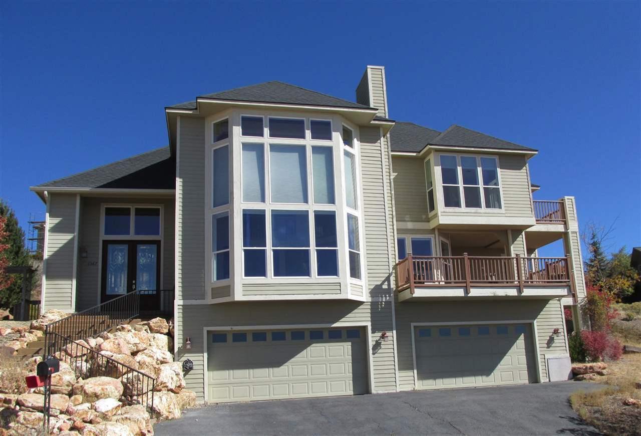 Beautiful Home With Amazing Views Of The City And Lake! Home Has A Beautiful Kitchen With Walk In Pantry. Tall Windows Throughout The Home To Show The Spectacular Views. Open Living Room And Kitchen With Gas Fireplace. Master Bedroom Has Gas Fireplace With Many View Windows And A Deck Along With A Large Walk In Closet And High Quality Master Bathroom. 2 Storage Rooms In The Basement And It Has A 4 Car Garage.Per Seller, All Offers Must Be Submitted Via Hubzu.Com. Online Auction, See Www.Hubzu.Com For Time Left. Buyer To Pay $299 Technology Fee And Buyer's Premium To Hubzu.Com At Closing - See Web Site For Details.
