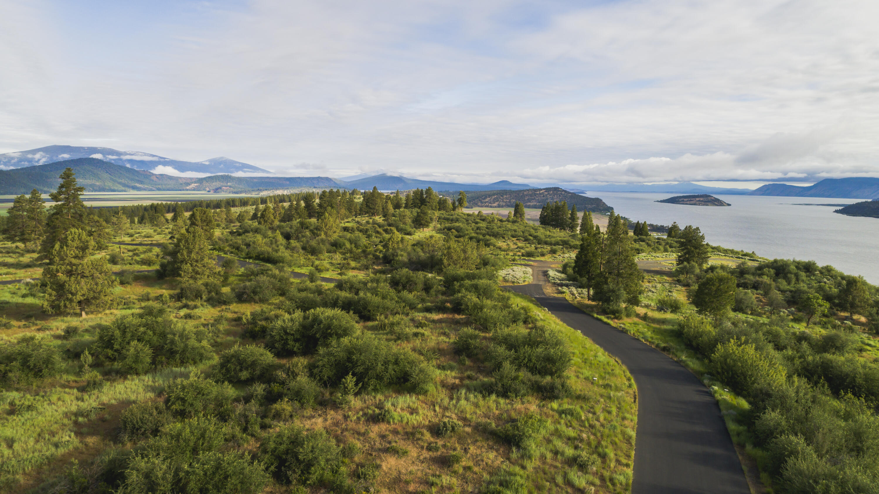Fabulous views on over 1/2 acre in the highly desirable gated & FIREWISE certified community of RidgeWater Properties. This property features expansive views of Klamath Lake, Crater Lake rim to the North, the City of Klamath Falls to the East all on a very straightforward build site. The property has been cleared & fire abated & is completely shovel ready with all of the utilities, natural gas, electric, water, sewer and Cat 5 internet. Wildlife & birding opportunities abound, with over 5 miles of walking/riding trails.  Mountain biking in RidgeWater properties is exceptional as is the privacy, safety & overall opportunities in the growing town of Klamath Falls.  Klamath Falls is experiencing an economic resurgence, & value that other parts of the Country are not enjoying.  This homesite is just waiting for you!  Call, text or e-mail for your private tour or virtual tour.