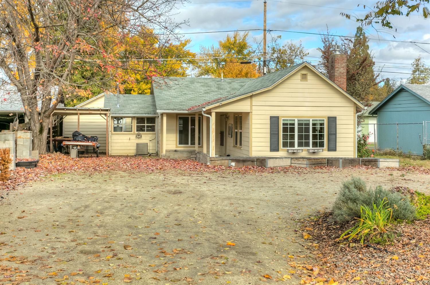 Amazing Cottage with Large parking area with room for an RV and a shop. Two Bedroom, 1 Bath with new flooring throughout. The Gas Fireplace insert will bring warmth and light to your charming living room. Bedrooms are comfortable and the newer kitchen will be a delight. New windows and siding. Don't miss out on this great home on a quiet street.