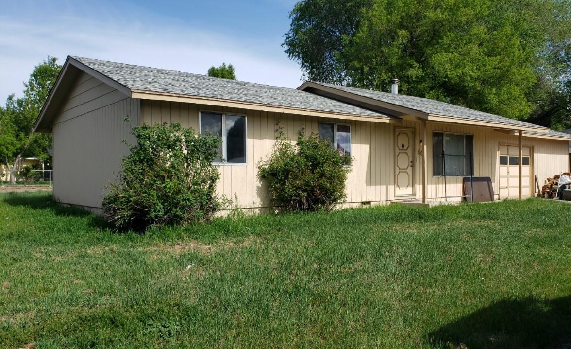 Great location in a quiet neighborhood in the SE portion of Prineville. This 3 bedroom, 1 bath home sits on a corner lot that also has alley access. Large lot provides plenty of room for adding on, additional garage, large shop or RV parking. Home is centrally located near the elementary, middle and high schools (see aerial picture). Back deck area. Garage is fully insulated and has some additional storage above. The home needs some TLC, therefore is price accordingly.