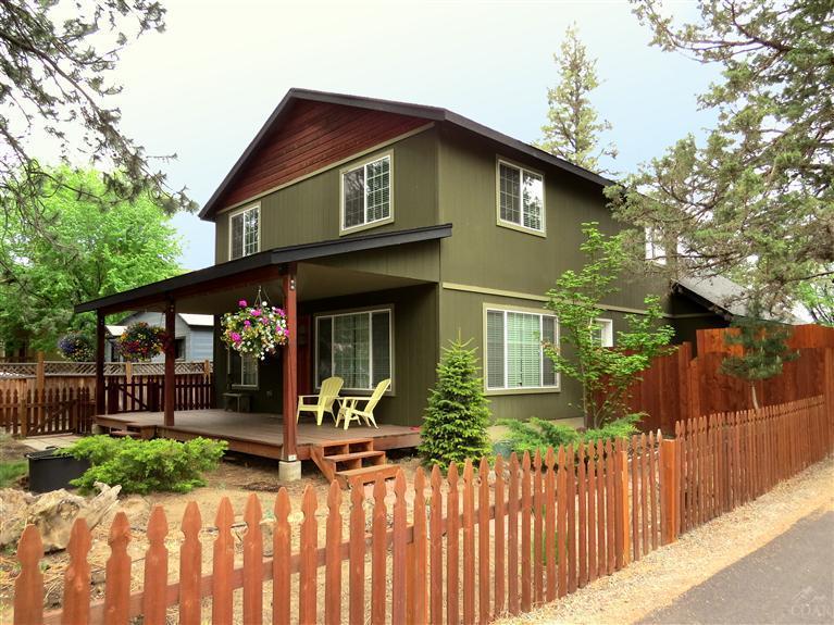Northwest Craftsman style home in Sisters. Oak flooring accents the open floor plan which opens to a large kitchen w/hrdwood cabts. Separate laundry & pantry rms. Bonus rm over 3 car attached garage is set up with a large screen TV & bunk beds. Electric forced air furnace & a gas stove for heat.Low maint. Yard is fenced with a front deck & the privacy fenced side deck is suitable for a Hot Tub. Home sold furnished featuring memory foam beds, refrigerator, W&D. RV Hook up. City park is across the street.