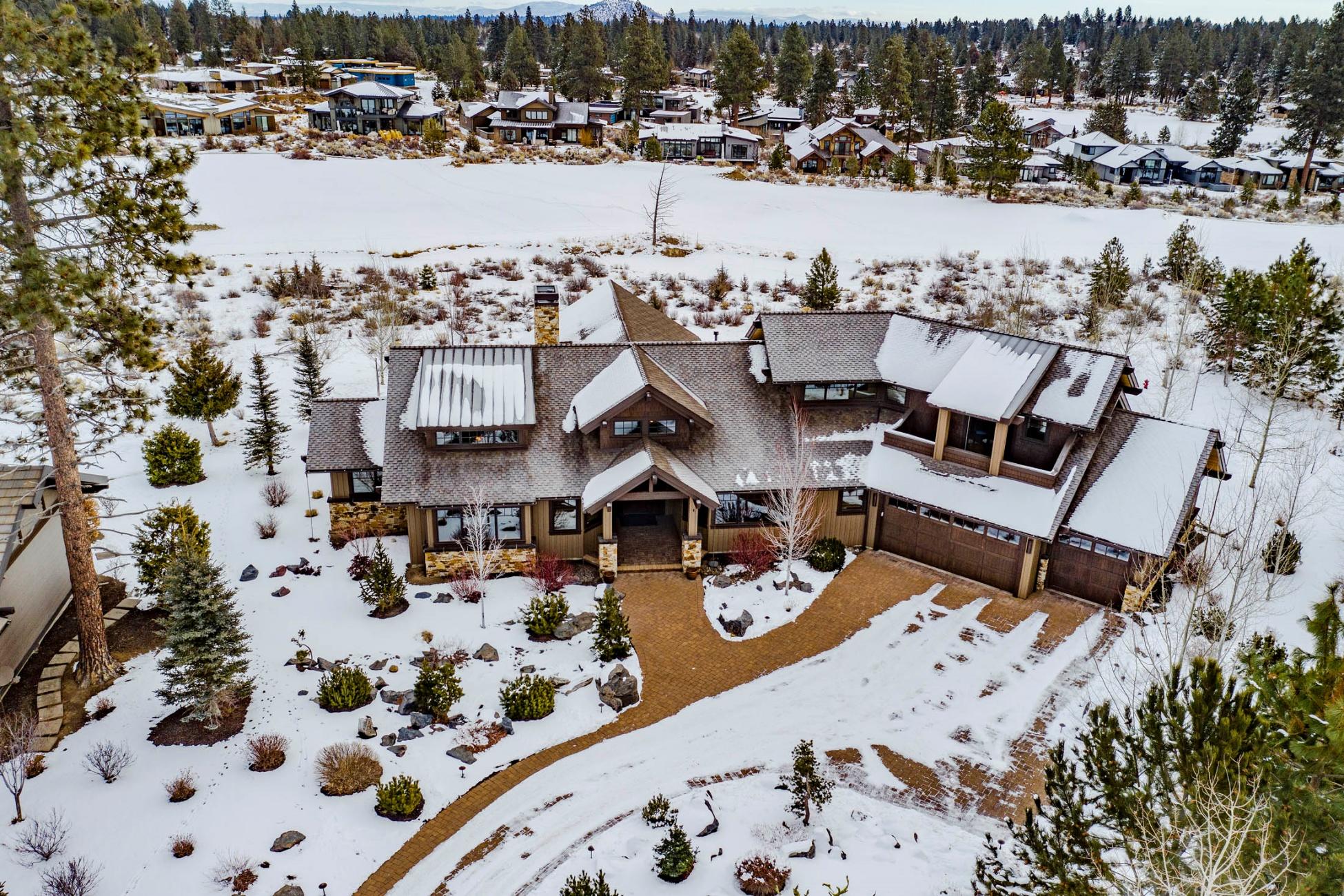 This is a one of a kind, Pacwest built home on a very quiet and sought after street within the Tetherow golf community. One can enjoy the grandness of the vaulted ceilings, natural stone, wood floors and northwest touches throughout. This is a progressive floor plan that offers functional livability with kitchen, dining and living space on the main level. The spacious master with a large walk in closet, and spa like bath, second ensuite and laundry/mud room. Upstairs is the office/den area and 3rd en-suite with a balcony to enjoy the westly views of the Cascade mountains. Special touches include remote blinds, private hot tub, gas fire pit, built in bbq, extended 3 car garage, paver driveway and stunning native landscaping. Enjoy the east views of the golf course and morning sunshine while evenings can be enjoyed from the front of the house looking west towards the cascade mountains!