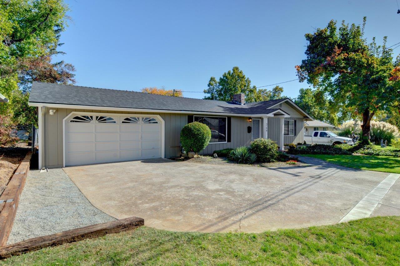 This beautifully updated, 4 bed, 3 bath home sits on a spacious 0.23-acre lot in a quiet, well-established neighborhood. This home shines with fresh interior and exterior paint, and a new roof! Inside, you will find brand-new windows, new ceiling fans, new carpet, granite countertops, a large kitchen sink, and all-new kitchen appliances! Outside features a brand-new sprinkler system in both the front and back yards, a large, fully fenced backyard with a covered back patio - perfect for outdoor dining, relaxing, or entertaining. Additional highlights include a 2-car garage and convenient proximity to the hospital, schools, restaurants, local amenities, and very close to the Rogue Valley Country Club. This home is move-in-ready and located in a prime and desirable location. Schedule a tour today!