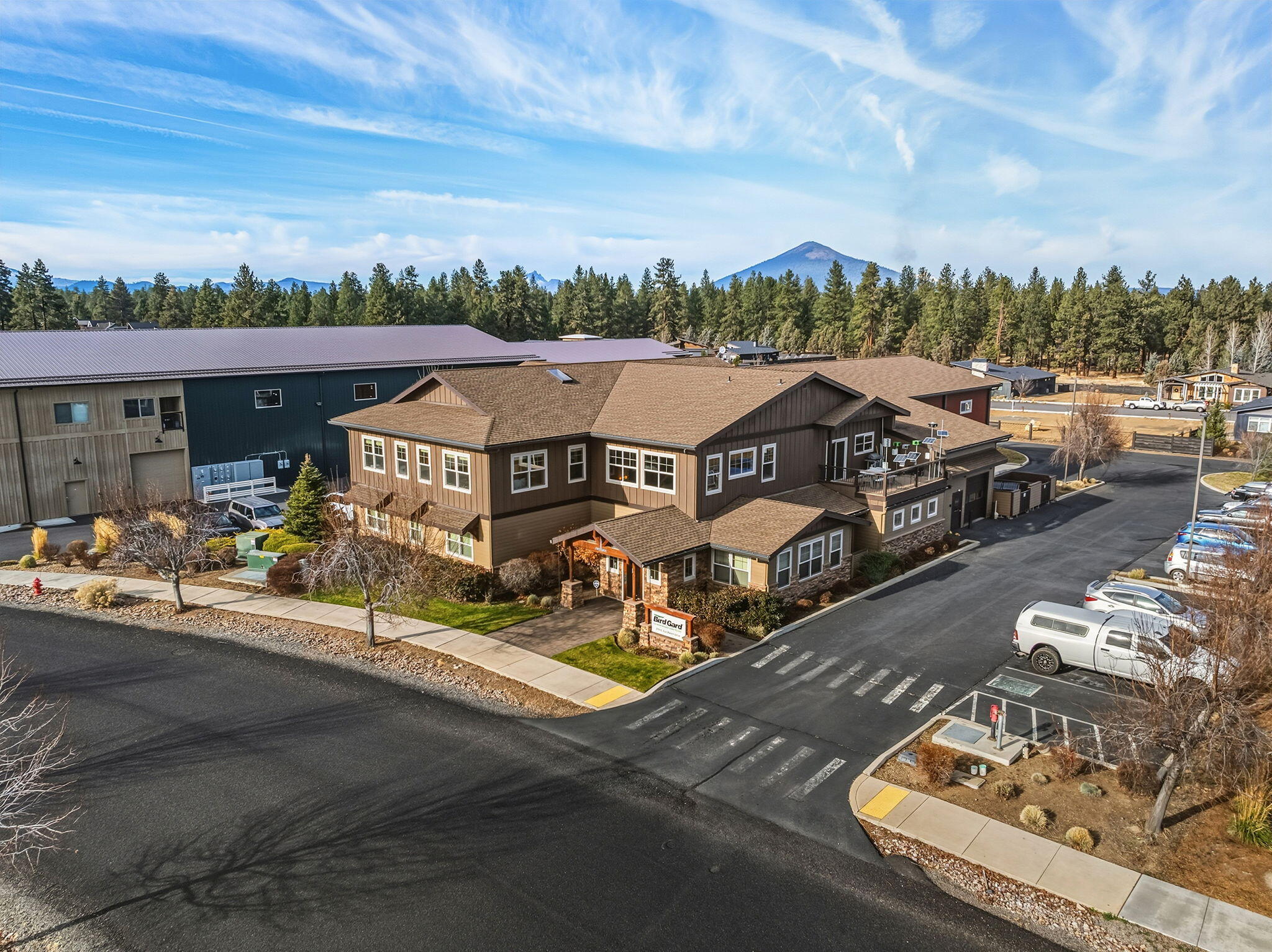 Stable, investment opportunity. This two-story, 11,554 sq.ft. building features upper-level executive offices, a spacious kitchen, and outdoor seating. The main floor offers a generous entry, conference room, and a manufacturing/assembly area. In addition, an extensive distribution and storage center including radiant floor heating and dock-high delivery.

Long-term tenant of 17 years in place. Current Triple Net lease runs 6 years with 2% annual increases, plus two additional 4-year options with market adjustments. Tenant is an International Company.