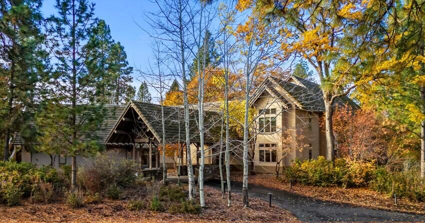 Redefining Mountain Living at the Running Y Resort!  Exceptional architecture and light filled gathering spaces characterize this one-of-a-kind home.  This 9,000 SF masterpiece includes formal living and dining areas, media room, elegant primary suite, expansive library mezzanine, 5 bedrooms, 5 full and 2 half baths, ''bunk room'' with bath, plus an attached apartment. The bright, large kitchen is the heart of the home with huge pantry, eating area and nearby sunroom, laundry room and outdoor patios.  Tastefully decorated, the home features new designer furnishings, paint, and carpet.  In harmony with nature, the tranquil views become part of the interior symmetry.  The panorama includes Oregon Cascades mountain range, verdant marsh and ranch lands and views of the expansive #6 fairway on the only Arnold Palmer designed course in Oregon. A separate one-bedroom apartment with private entrance completes this quintessential mountain home.