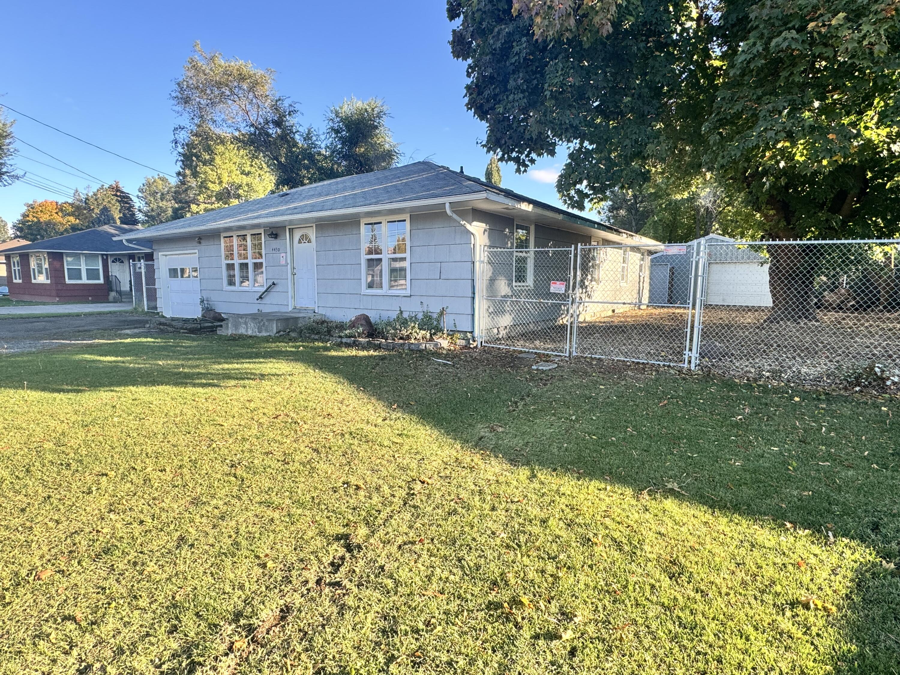 A house to please everyone! VA assumable loan at 2.25%
Home sits on oversized lot with a shop that has power and fully insulated, room for RV parking with double gate and a large fenced yard private backyard. New flooring, newly painted cabinets, new paint, larger new deck, MOVE in ready! 
Priced to move. 
Lots of bedrooms and bonus extra living room with open floor concept. 
Home could be split for multi family or multi generation living if desired. 
Easy to show and ready to go!