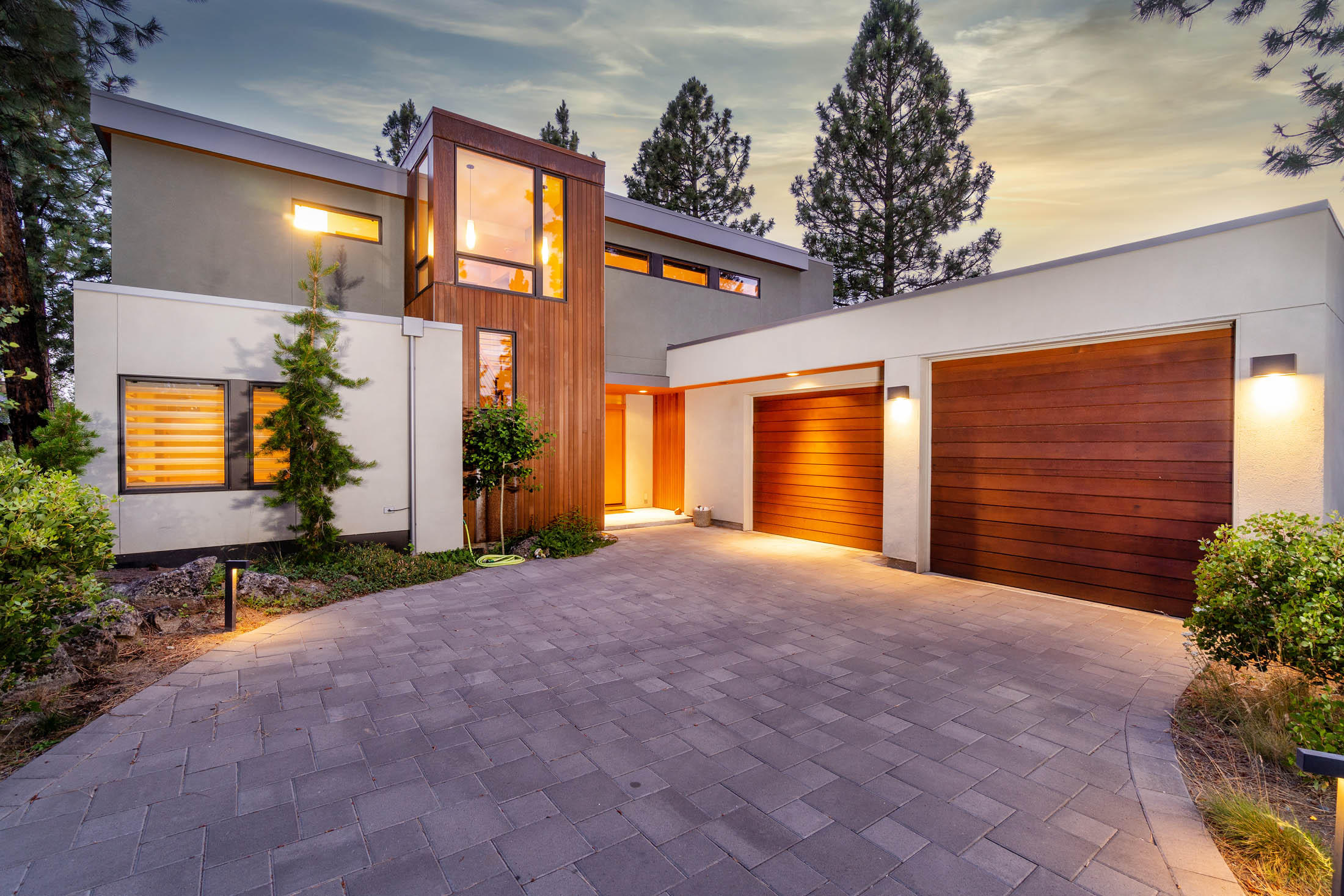 This contemporary, modern, green structure, designed by local architect Erik Oldham, and built by Woodcraft Environmental Builders, fits well within Shevlin Commons, Bend's most architecturally modern residential community. Well thought out design which focuses on function and environmental concerns. Built in 2014, it received a Platinum Certification from Earth Advantage  for energy & resource efficiency and indoor air quality. A jewel box of artistic details soften the modern lines & make it a home. Kitchen, living, dining, flex-bedroom & master suite are all located on the ground floor. Beautiful interior finishes include 11.5 ft ceiling of exposed double beams, paneled with Douglas fir, rift cut white oak floors, pellet fireplace, quartz & black granite counter tops, Douglas fir cabinets, Miele dishwasher, Wolf oven & cook top, Subzero refrigerator, large walk-in pantry, Shoji style sliding doors, cable lighting & clearstory windows. Abundant natural light & warm southern exposure.