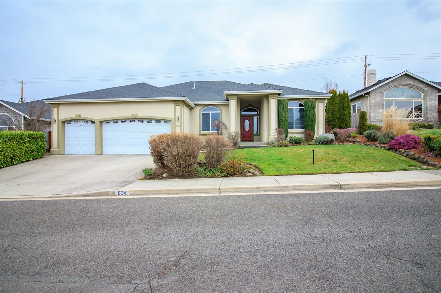 Beautiful 4 BR, 2 Bath home in newer E. Medford neighborhood. The open floor plan is wonderful for entertaining. The house has been freshly painted inside & out, and the Kitchen was completely re-modeled 3 years ago with new cabinets, appliances, leathered granite countertops, and a walk-in pantry. The master bedroom/bathroom just had a $30k remodel in 2017, including a large tiled shower, soaking tub, and leathered granite countertops. The extra large 3-car garage has an epoxy painted floor, and a finished 200 sq ft overhead storage area. New ultra-efficient Hybrid HVAC system installed August 2017. Come take a look, you won't be disappointed.