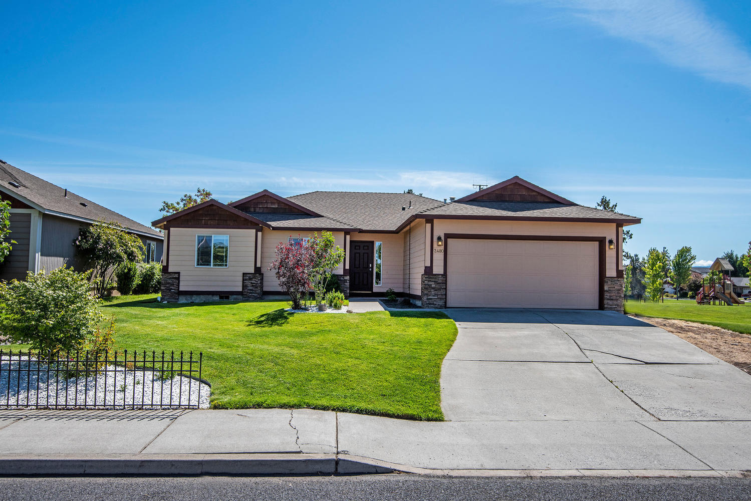 Come see this lovely and well cared for Redmond home that backs to Diamond Bar Ranch Park! This home features a large open concept family room with a gas fireplace. The kitchen, dining and flex space have new luxury vinyl floors. Home has nice vaulted ceiling, tile countertops throughout and the formal dining room/office area/flex space is a true bonus as this home lives much larger than its 1,657 sq ft.  The master suite is extra large with french doors, space for an office, large walk-in closet and double vanities.  There is a double car garage and the exterior features a fully fenced and landscaped backyard that backs up to & has a gate out to the park. This home has very easy access to hwy 97 and North Redmond shopping. It's a must see!