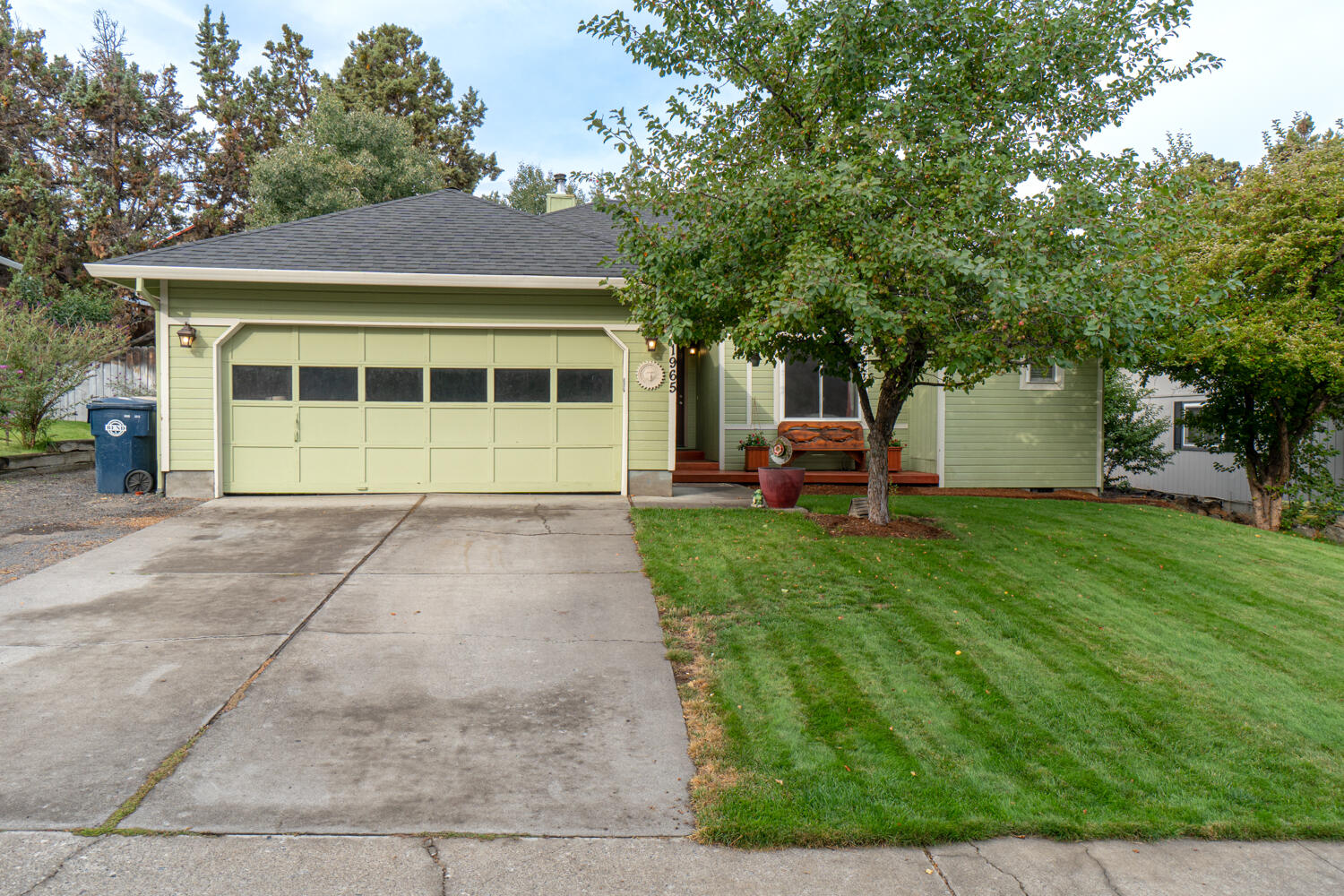 Don't miss this charming home located in an established neighborhood in desirable NE Bend. Home ftrs an open living space w/large windows for an abundance of natural light plus a cozy wood burning stove in the great room. Laminate flooring in main living areas + carpet in bedrooms. Kitchen w/plenty of cabinetry & counter space opens to eating area & sliding glass doors to the outdoors area & deck. Primary bedroom ftrs carpet flooring, double vanities in the bathroom w/step in tiled shower. Two guest bedrooms share a full bath w/shower & tub combo. Out back you'll find a generously sized backyard landscaped as your own private oasis w/deck, pergola, built in seating, rock/garden outcropping & plenty of space for entertaining. Minutes from Pine Nursery Park, near the hospital, shopping, schools + entertainment, & all that NE Bend has to offer. Space for your RV or additional parking, storage/wood shed, plus 3 yr old roof. New Carpet being installed + fresh paint in guest bedrooms too!