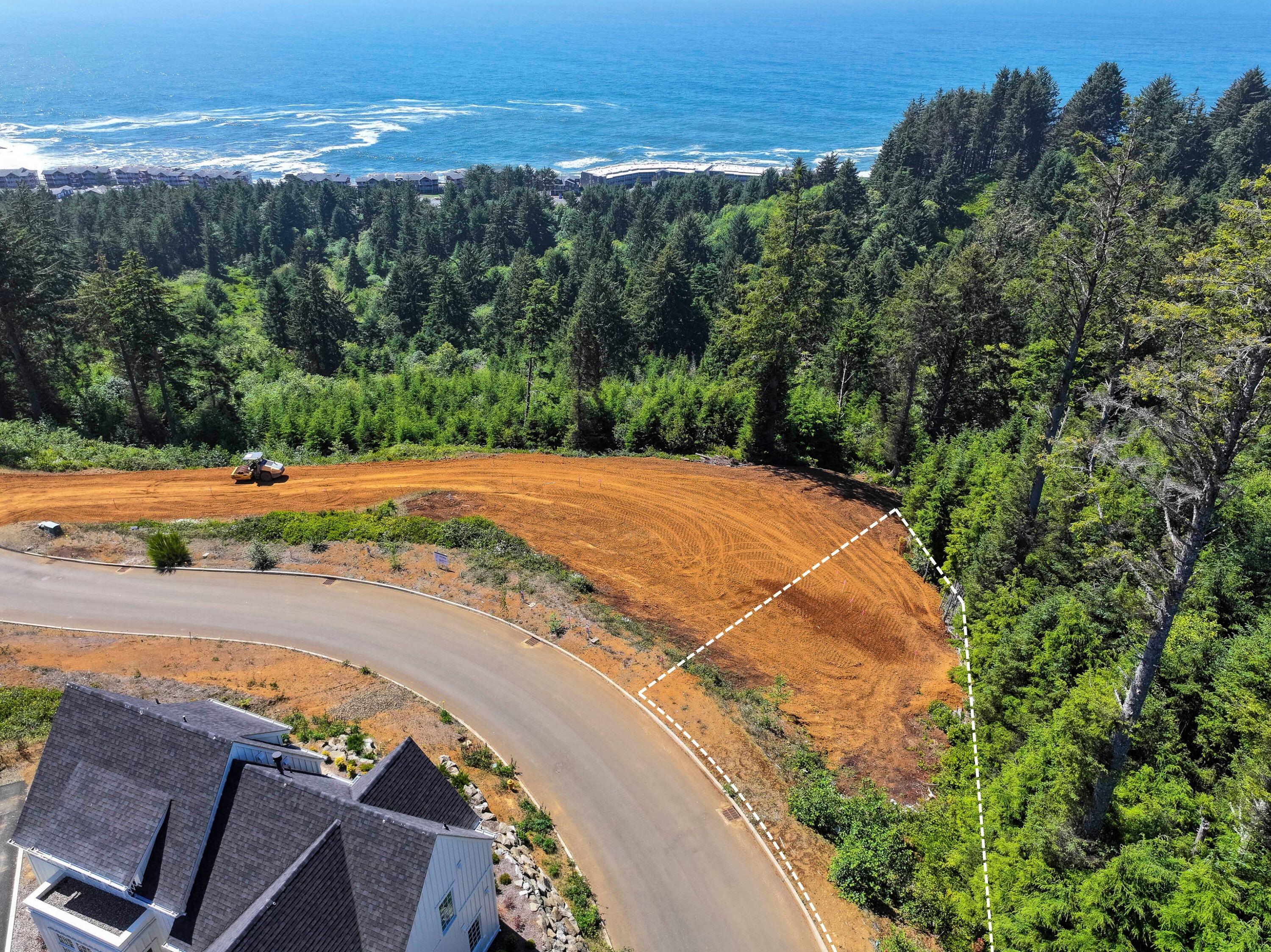 Set along the crest of Depoe Hills with ocean and forest views, Lot 3 is a rare offering in this thoughtfully planned coastal community and one of only three remaining homesites in Phase 1. Here, your time will be spent watching the whales breach, the eagles soar and the sun slowly set into the sea in a quiet display of coastal grandeur. Just up the street from Depoe Bay's iconic harbor and charming town, this lot offers a balance of seclusion and accessibility, with boutique shops and celebrated dining moments away. Pre-approved plans for a refined three-bedroom residence are included, designed to harmonize with the land and elevate the view. This is a final chance to shape a legacy home within a setting that honors nature, community, and the enduring beauty of Oregon's central coast. Lot lines and renderings are approximate and plans are subject to change.