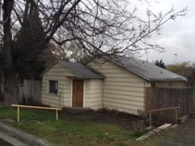 Price Reduced! Cute cottage on a big lot! Nice hardwood floors as you enter a very spacious living room. Sliding glass door leads out to a large deck with a hot tub/spa. Kitchen has many cabinets and lots of counter space. Cozy dining area. Both bedrooms have generous space and storage. The yard is very big with raised garden beds and several fruit trees.