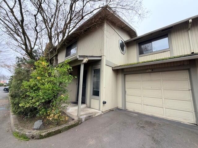 Spacious 3 bedroom, 2.5 bathroom with 1 car garage.  All appliances including washer and dryer included.  Nice rock fireplace in living room and roomy dining room with sliding glass door to covered patio and yard.  All bedrooms are upstairs. HOA features a Pool, Water, Garage, and Sewer.  Home is in good condition and ready for new owners!
