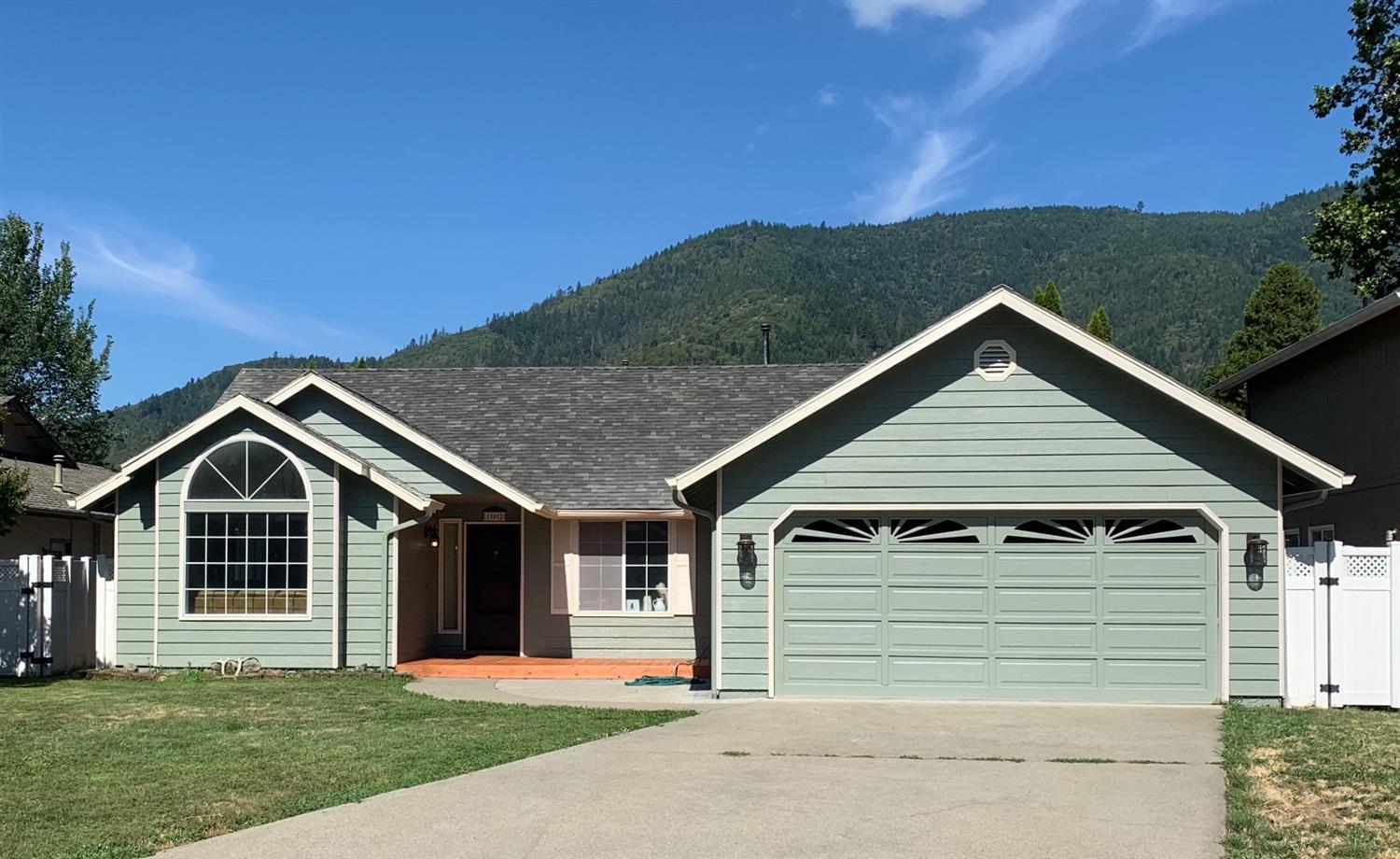 This well appointed 1594 sf home sits on an oversized city lot close to the city of Rogue River. New roof, flooring, and interior/exterior paint are just a few of the recent upgrades done (2018). Large formal dining room, beautiful upgraded kitchen, vaulted ceilings, and crown molding through out. A beautiful back yard with large patio that is perfect for entertaining. Listing Broker is related to Seller
