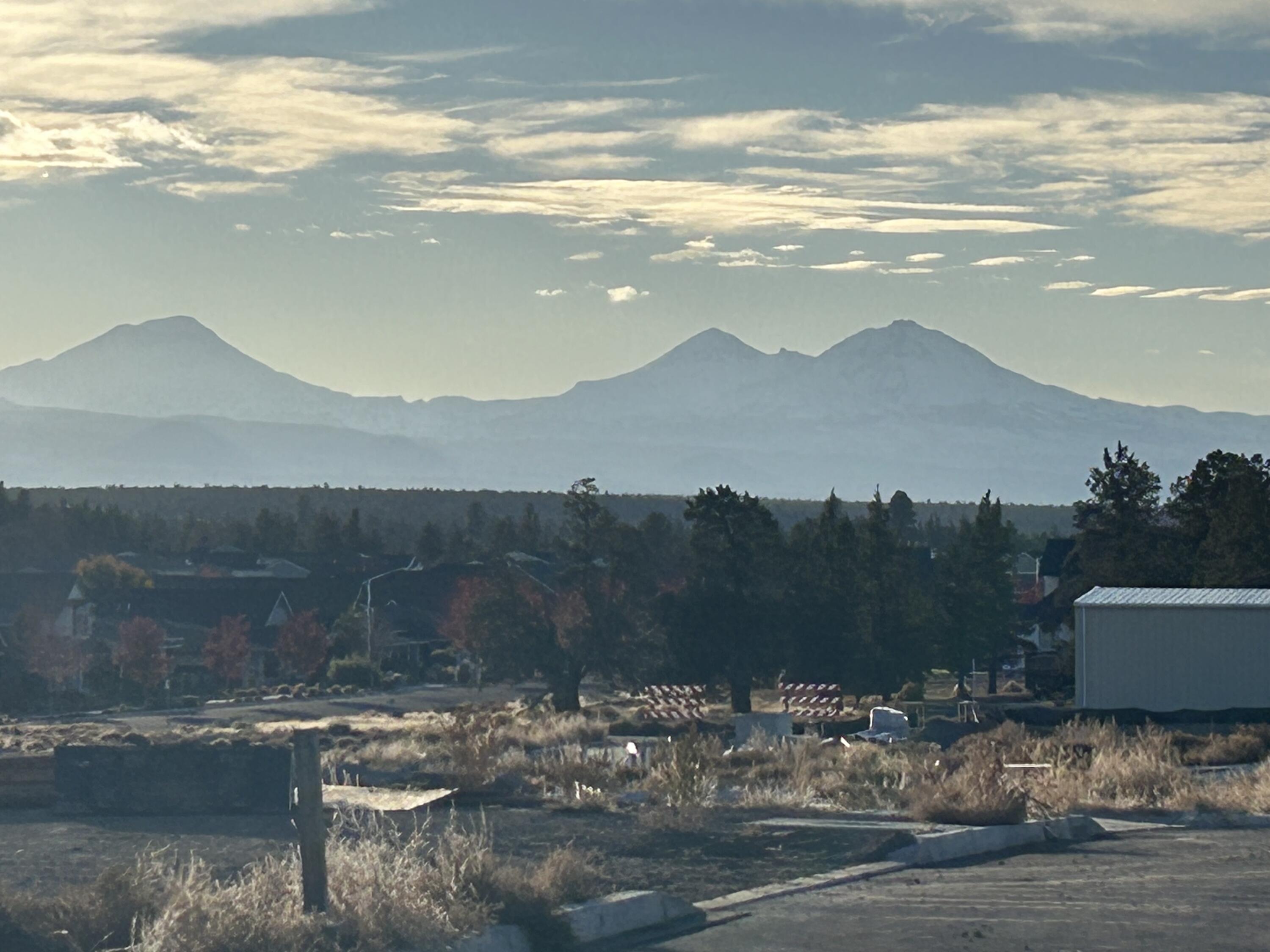 Amazing mountain views on corner lot! Under construction. *Up to $10,000 CREDIT! The Hamilton features open floorplan, vaulted ceilings, 3 bdrms + office/den, 3 car garage & RV parking w/ rd bay has 12' door height to fit recreation vehicles. Upgraded finishes include quartz counters, A/C, tankless water heater, landscaped front & backyard. Primary bdrm features backyard patio access, XL walk-in closet, bath w/ double vanity, tile shower & enclosed toilet. Kitchen complete w/ SS appliances, soft-close cabinets, full-height tile backsplash opening to dining room & great room w/ decorative gas fireplace & 2nd access to backyard patio. Owen Ridge is a new SW Redmond neighborhood within blocks of coffee shop, gelato, brewery restaurant, schools & short distance to golf, airport, & shopping. Est. completion end of Feb. Photos of similar floorplan home.*Floorplan & rendering subject to change*Up to $5,000 Seller credit & up to $5,000 preferred lender credit. Ask LA for details