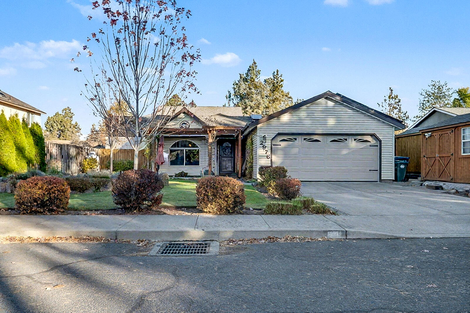 Welcome to this charming single-level home in the heart of Central Bend, where comfort meets thoughtful upgrades. Inside, new flooring, updated windows, and fresh interior details—including all new doors, trim, and window sills—create a bright, cohesive feel. The remodeled kitchen features sleek countertops, modern finishes, and new pantry shelving, while both bathrooms have been beautifully updated. Energy-efficient living shines with an 8.7 kWh solar array and new ductless heating system. Two gas fireplaces, including one new in September, add warmth and ambiance. Enjoy a fenced backyard retreat with mature gardens, a custom pergola, and hot tub. Additional highlights include a powered skylight, two Solatubes, new electrical panel with 50-amp EV-ready circuit, two 10x12 sheds, and stainless appliances with a new dishwasher and microwave. Perfectly located near shopping, parks, and all that Bend offers—this home is truly move-in ready.