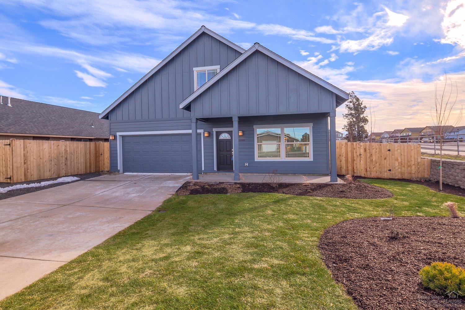New construction100% complete in SW Redmond's Julina Park. 3 bedroom, 2.5 bath home in excess of 2,007 sq.ft. of living area. Large great room that opens to the dining and kitchen with eating bar. Knotty Alder cabinets with tile counter tops, all stainless appliances. 30 year roof, forced air gas that is AC ready. Separate utility room. Double car garage. Landscaped front and with sprinklers. Back fenced. Great curb appeal.