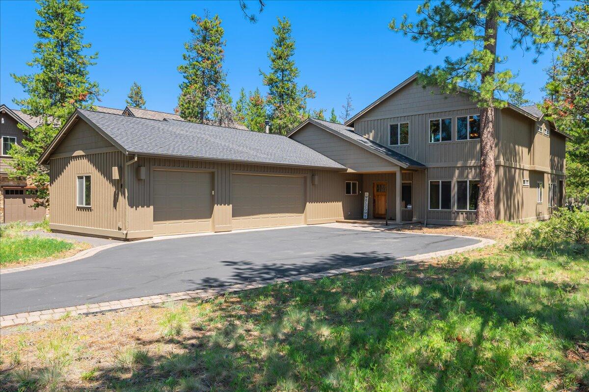 Welcome Home to 8 Cottonwood Lane in desirable Sunriver!!  Gorgeous craftsman style home featuring 5 bedrooms and 5.5 bathrooms!  Plenty of room for the whole family with 3 primary suites on the main floor and 2 on the second floor. The cozy living room offers an open floor plan with vaulted ceilings, floor to ceiling slate gas fireplace and a wall of windows overlooking the pine trees.  Kitchen features granite countertops, SS appliances, gas cooktop, island, knotty pine cabinetry and hardwood flooring. This home has a 3-car garage for all of your toys, multiple patios for entertaining, hot-tub, built-ins in several bedrooms, gas hook-ups available on back patio and comes fully furnished!  Recent updates include exterior paint (2021), hot tub (2020), and newer furnace (2021).