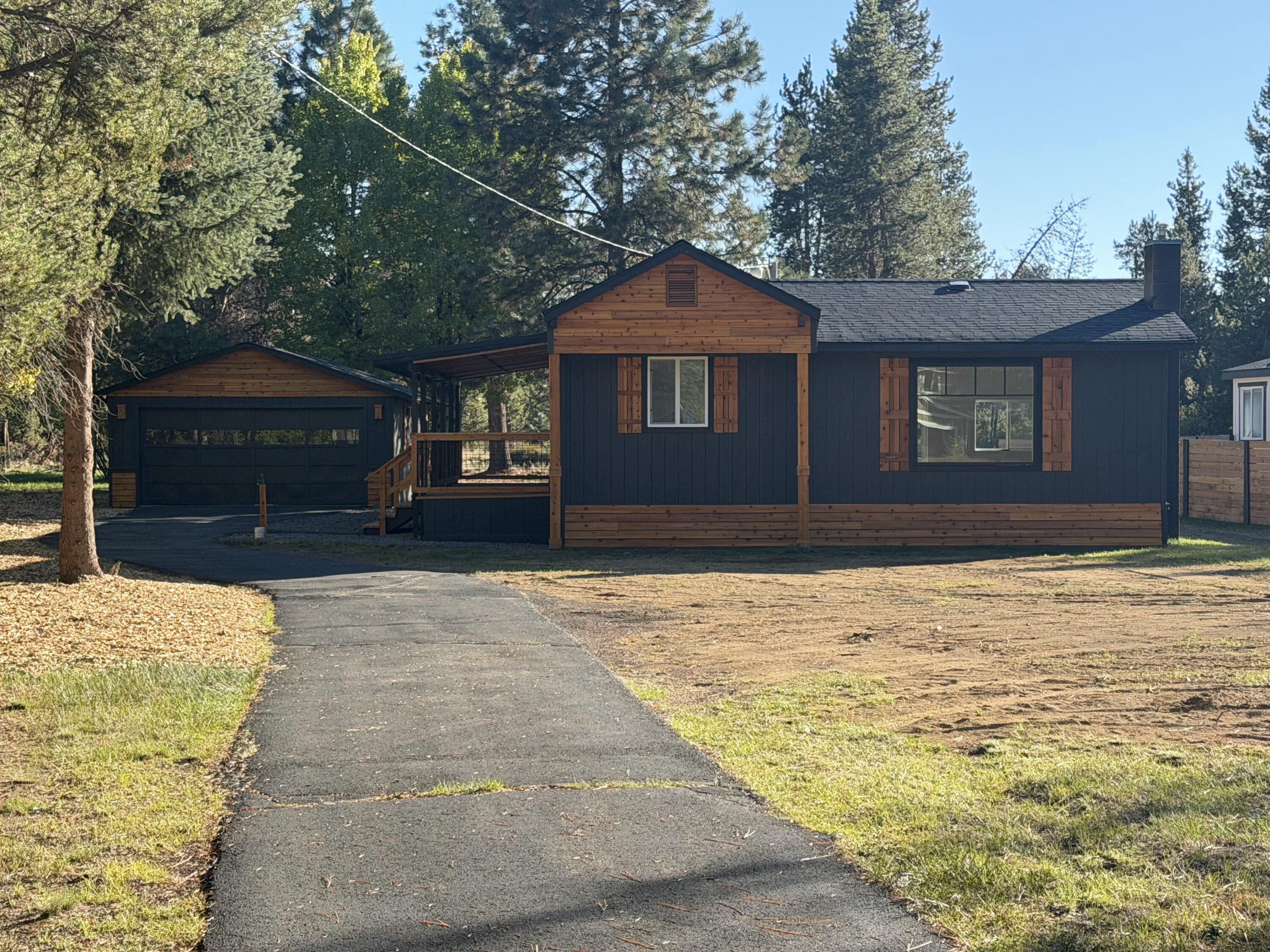 This home is located on .46 acre lot with community sewer and water, paved roads with access to the Big Deschutes River and marina. 40 acres of National Forest that boarders the Big Deschutes river for access to fish and enjoy the river. This 1970 manufactured home has been completely remodeled with a new composition roof, new floors, new kitchen cabinets, new counter tops, new lights, new bathroom and tub/shower. New drywall and paint, new windows, new mini split heating and cooling system, Large covered deck and rails, New paver patio. Plus there is a detached 2 car garage with asphalt driveway. This is a must see property S.ELLERS WILL CARRY A CONTRACT WITH ACCEPTABLE
CREDIT SCORE WITH $50,000.00 DOWN 7% INTERSEST FOR7 YEARS AMORTIZED OVER 15 YEARS.