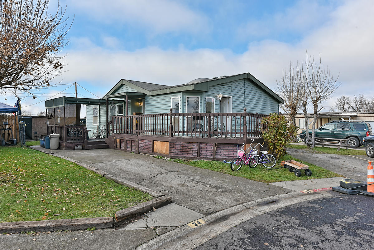 A rare mobile home in a park in White City! Sitting at 1080 square feet, this home has 3 bedrooms and 2 baths and is very spacious! Tucked away on a dead end road with little to no traffic, this mobile offers plenty of parking and has a fantastic, open floor plan with recent updates throughout. The living room, dining room, and kitchen all open up to each other allowing plenty of natural light to filter in throughout the home. This property also includes a deck, patio and a shed for extra storage space! The master bedroom comes with a nice walk-in closet and master bath, with the spare bedrooms being good sized. This unit along with unit #37 in cul-de-sac are owned/listed for sale by same owners. So if you're looking for a multiple family set up, this could be it! Don't miss out on this opportunity, it will not last long!