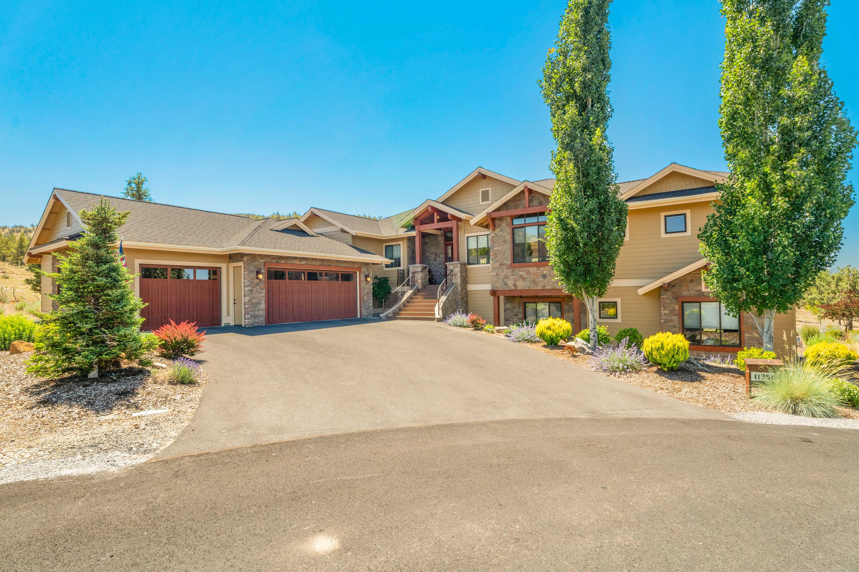 Gorgeous custom home with panoramic views of the Cascade Mountains and a very private setting that backs to common space and public land in Eagle Crest Resort.

Timeless finishes including solid hardwood floors, knotty alder solid core doors and trim, hand troweled walls, slab granite countertops, and tile floors in the bathrooms, and mud room. 

Great room with soaring ceilings, floor-to-ceiling stone fireplace, an open kitchen with island and professional-grade appliances, and a spacious dining room that leads to the expansive covered TimberTech deck.

Luxurious primary suite with stone fireplace, dual walk-in closets, soaking tub, walk-in shower, and dual sink vanity.

Dedicated office with built-ins, mud room with abundant storage, & a half bath for guests complete the main level.

You will find three additional guest rooms, a full bath, family room with fireplace & wet bar, plus a huge storage room on the lower level.

Oversized 1124 Sq Ft triple-car garage.