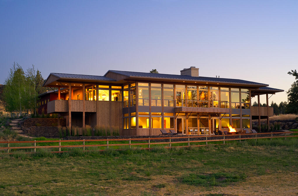Striking Modern Agrarian estate nestled inside of the Idyllic Deschutes River Ranch with 2 miles of private Deschutes River waterfront & nearly 500 acres of ranch- community land set among exquisite estates. This custom home features walls of glass that seamlessly invite the outdoors in! Accents of reclaimed wood, lime plaster, cowhide panels & board formed concrete add the finishing details to this extraordinary design. A place where a river runs through it and memories are waiting to be made!