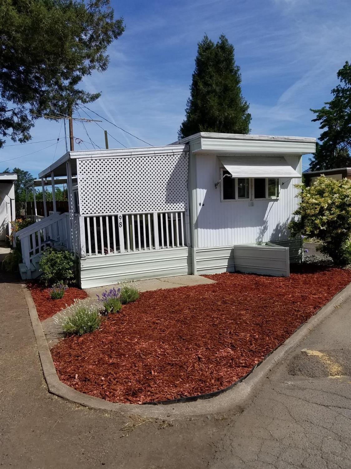 Move-in ready to this 55+ community! This sweet 1 bedroom, 1 bath has some refreshing updates and has so much to offer. Upgraded features throughout : New stove, One year new washer and dryer, One year new water heater. Second bedroom converted into laundry room with lots of storage . Home offers a lovely eat in Kitchen, covered deck, covered carport with 10'x5' shed, Fenced backyard, Vinyl windows, Rubberized roof. Swimming pool and clubhouse, One small dog allowed. Must see this to appreciate! All information deemed accurate but not guaranteed and subject to change at anytime.