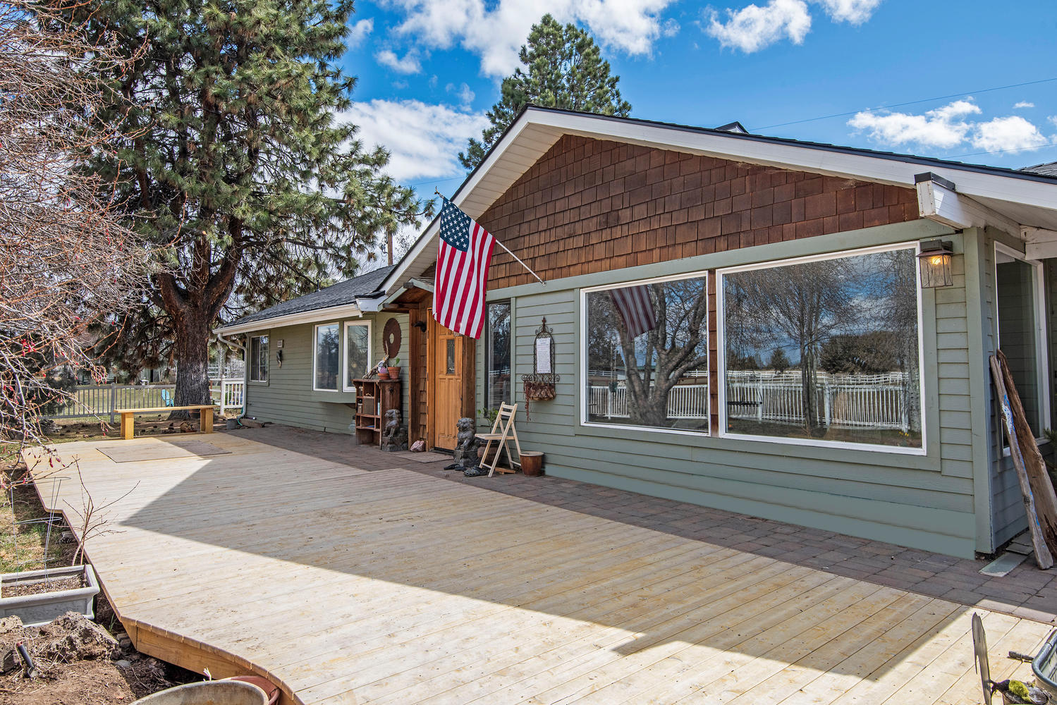 Looking for a small equine/hobby property, or just extra space? This 1779 s/f single level ranch style home on 3.89 acres with 3 beds and 2 baths fills the dream. Fresh paint, newer roof, new appliances, and updates throughout. Spacious living area with cozy gas fireplace and pastoral views. Master bedroom has huge walk-in closet with barn door and french doors to outside. A 3 stall horse barn with tack room, greenhouse, chicken coop, and pond. Property is fenced and cross-fenced 3.3 acres of irrigation and gated driveway. Minutes from Costco, shops and restaurants yet away from it all. Plenty of room to relax and enjoy your own sanctuary.