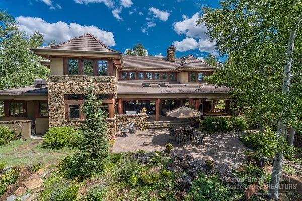 This custom home located in the celebrated Crosswater Golf Club is situated on .49 private acre on large private pond. Only 119 owners will call these amazing 600 acres home. NW lodge style home features open floor plan w/magnificent beamed ceilings, massive rock FP, stunning log staircase, waterfront views from extended covered patio. There are 4 bedrooms, 3 are suites, large bonus room, casual & formal dining. Enduring design & extraordinary craftsmanship. Attention to detail is evident in all aspects.