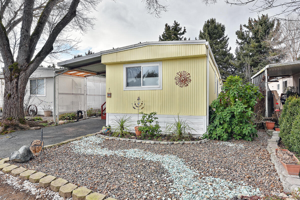 This beautifully remodeled 2 bedroom 2 bathroom home has a charming character you will fall in love with! The sun's rays stream through every window and illuminate the living areas with abundance of natural light to brighten your day. In the spring you will be surrounded by vibrant and delightful hummingbirds that frequent the area, adding to the ambiance of your surroundings. You'll love the convenience of the doggy door and fenced play area for furry friends. Relax and unwind on your private back deck where you can enjoy spectacular views of the sunset. This home has been lovingly remodeled and well-maintained, providing a warm and inviting space that you'll be proud to call your own. Located only 2 miles from fun, historic Jacksonville and yearly Britt festival, this home is in a highly desirable park that offers one of the lowest rents in the area. Don't miss this opportunity to own a stunning home with tons of character in a great location. Schedule a viewing today!