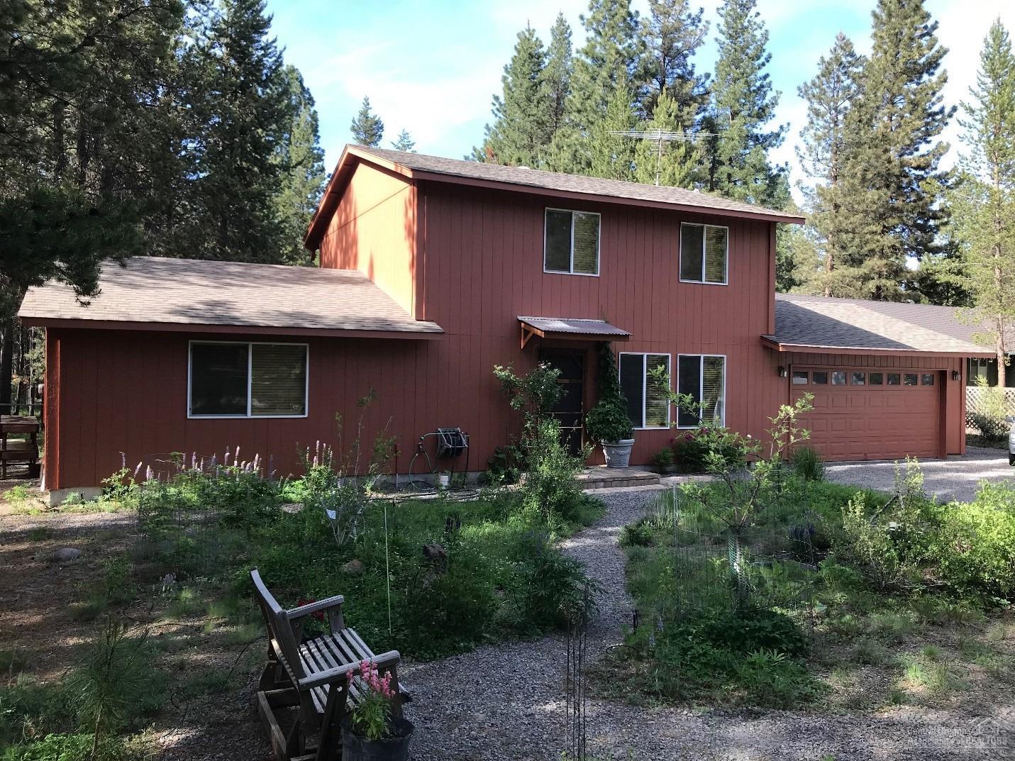 Your slice of outdoor paradise! Live close to Sunriver and LaPine State Park. Private community access to the Deschutes River, along with miles of walking or cross-country skiing. Easy access to Mt. Bachelor for winter sports. This home is ready for your family and furry friends as it is completely fenced. This home is an attractive two story 1680 square foot 3 bedroom/2 bath home with a family room upstairs. This house offers an open concept in the dining and living rooms with a beautiful slate hearth ready to insert the stove of your choice. This home has had updated flooring and installation of top of the line kitchen appliances. Outside has newly painted exterior with quality paint that will last. Home has a covered front porch entry and a large back deck off of the dining room for easy access to the bbq and back yard. Fully landscaped natural looking backyard with mature plants and trees, all watered by a drip irrigation system. Come and enjoy the peace and quiet.