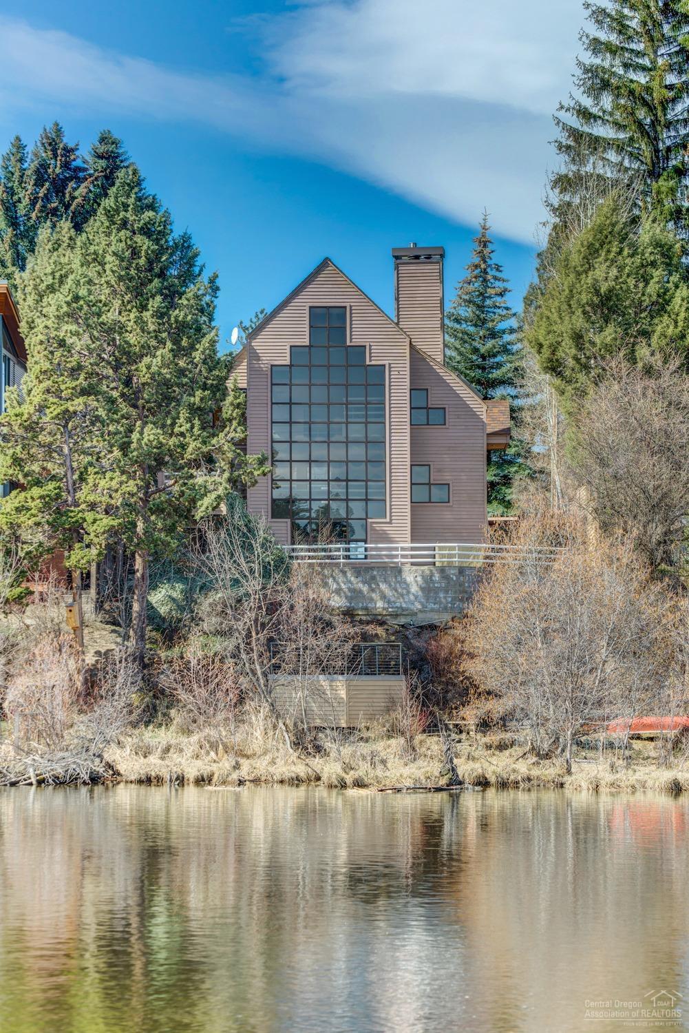 Beautiful riverfront home with spectacular views, located within walking distance to all of Bend's hot spots! A few minutes walk to trendy Galveston, Downtown, Old Mill District and right next to Columbia Park. Walk to the Pavilion Ice Rink, surf wave, and quick 25 min drive to Bachelor! This home has been partially remodeled, county records show 3 bedrooms, there are 2 true bedrooms and the 3rd could be converted. Short Sale w 3rd party approval.