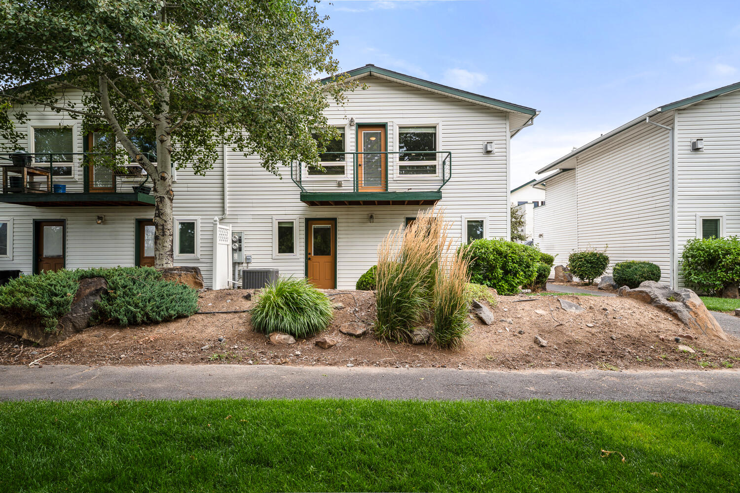 Nestled in the sought-after Boulder Brook community, this spacious end-unit townhome is the perfect blend of comfort and convenience, The open-concept upper level features a light-filled kitchen, dining, and large living area that opens to a private deck. The primary suite includes a walk-in closet and a luxurious jetted tub and large deck. On the lower level, two additional bedrooms offer direct access to the shared outdoor greenspace. HOA dues cover water, sewer, roofing, siding, exterior, deck maintenance, landscaping, and snow removal, making for easy, low-maintenance living.
Key Upgrades include: Luxury Vinyl Plank flooring throughout, New AC/Furnace in 2024, and Interior Painted in a light and bright color.
Key highlights: One of the largest Premier units in the community at 1731 sq ft, the best setting with the Gazebo, Ponds and greenspace right out the back door, and the best value at $187/sq ft and priced for immediate sale!