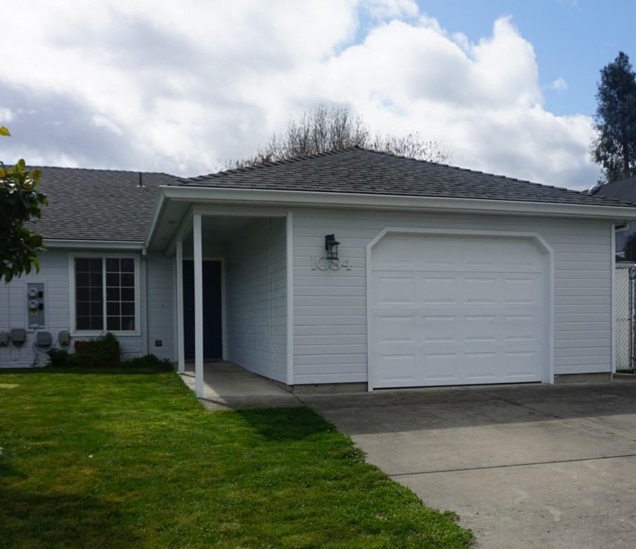 The seller has prepared this home with new paint inside and outside. New floor coverings. This home is move in ready. Easy care small back yard and front yard. There is a potential for a small RV parking. Very close to schools, shopping, I-5 access, parks, Family Fun Center, Jackson County Expo fair grounds and so much more.