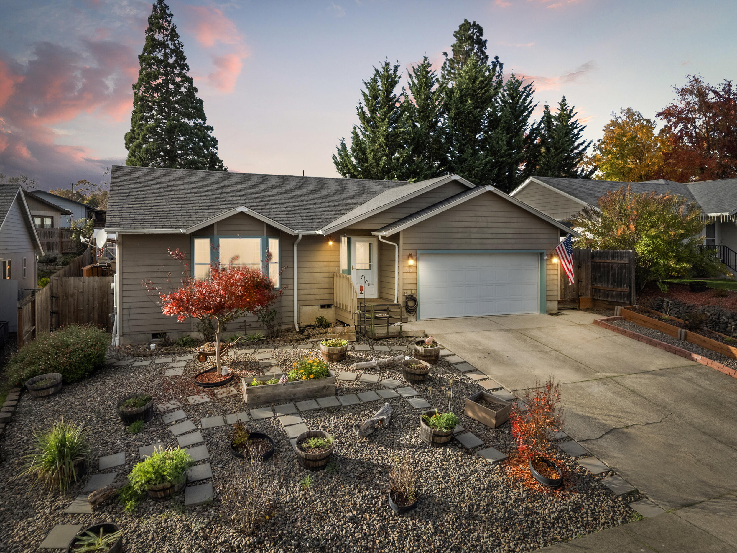 Welcome home to this beautifully maintained, move-in ready 3-bedroom, 2-bath property featuring an open floor plan, vaulted ceilings, new LVP flooring, fresh paint, and plenty of storage. Located in a friendly, safe neighborhood with wonderful views. Enjoy the well-manicured, low-maintenance yard, private backyard, spacious deck, garden area, and greenhouse—perfect for families or retirees seeking quality and comfort.