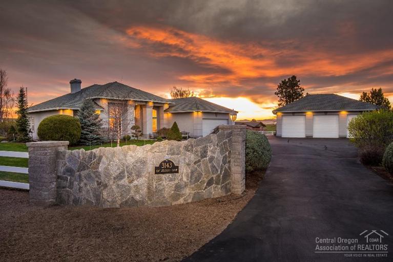 Classy stucco home on 1.92 AC in West Hills. Stone entry w/paved drive leads to beautiful private irrigated oasis. 3bd,2ba + office/den. French doors to L/R, formal D/R, breakfast nook w/butlers station. Cooks dream kitchen w/cherry wood appointments, rotating pantry &spacious counters. Split floor plan, master suite w/patio access to hot tub. Meticulously manicured back yard, stamped concrete patio w arborvitae and vinyl fencing to create a tranquil setting. 1220sf garage/shop.
