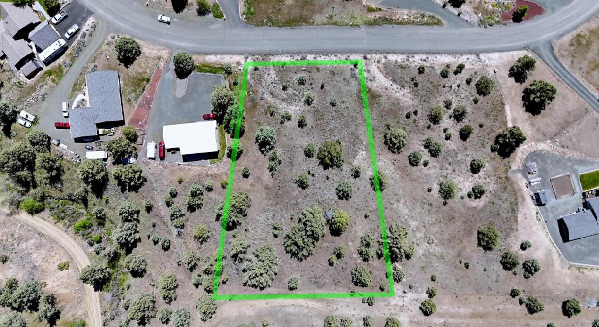 A prime 1-acre plot in the prestigious Iron Wood Estates Subdivision awaits your dream home construction, boasting southern exposure. Access to city water and sewer connections on the street, as well as underground power. The start to a driveway has been cut in. Get ready for your dream home by leveling the house pad on this property. Located in the proximity of the 7th street complex and scenic walking trails, you can enjoy stunning sunrises and sunsets from this picturesque setting.