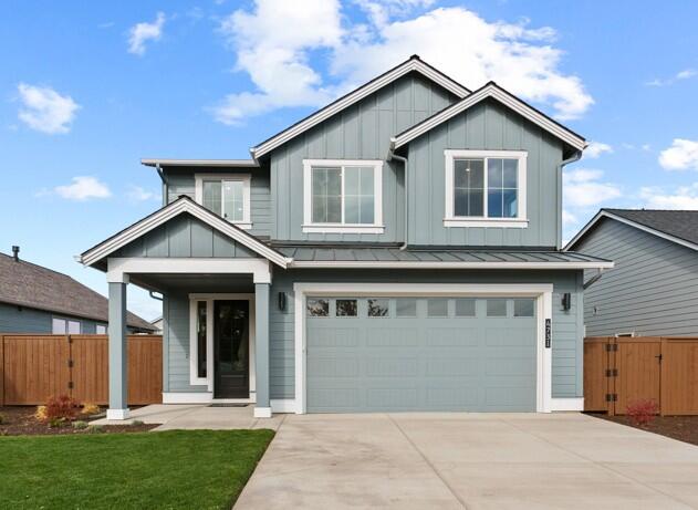MOVE IN READY! - The Final Benjamin plan at Trailside on a 6,614 sf lot built by quality award winning builder Pahlisch Homes. This beautiful home has all the luxury features you expect from this builder. The open floor plan offers a spacious great room, open kitchen, full bedroom and bath downstairs, large loft, and a beautiful primary suite!  Kitchen boasts KitchenAid SS appliances inluding cooktop with hood and wall oven.  As in all Pahlisch Homes, well-crafted finishes are used throughout such as solid Quartz counters, luxury laminate flooring, shaker style white cabinets, living room fireplace, 6-inch baseboards, covered back patio, fencing, A/C and much more. Let the HOA care for your front yard and enjoy all the Redmond OR has to offer.  Located on the SW edge of Redmond, just minutes from Bend, the Airport, Smith Rock State Park, and downtown shops. Two ski resorts Hoodoo and Mt. Bachelor are less than an hour away. Inquire about below market rates with our Preferred Lender.