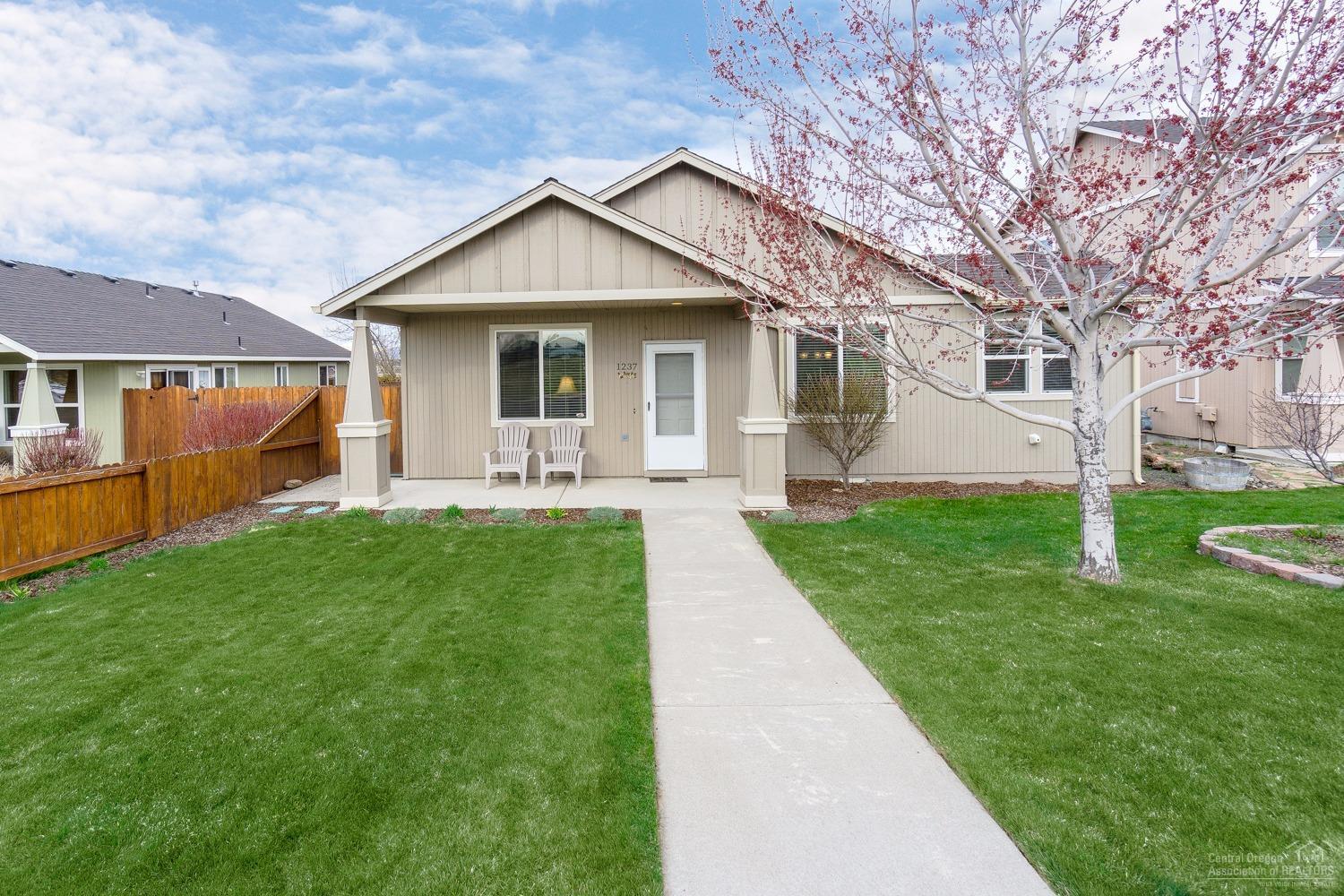 Don't miss out on this one! 3bd/2ba home has been updated inside and out. Newer interior/exterior paint, laminate flooring, carpet, fixtures, blinds and the list goes on! Spacious living area with separated dining. Kitchen features a breakfast bar w/granite countertops, tiled backsplash and SS appliances. Summer-ready with A/C, front covered patio, and landscaped front yard with sprinkler system. Alley access provides a private entry to dbl attached garage and RV parking.