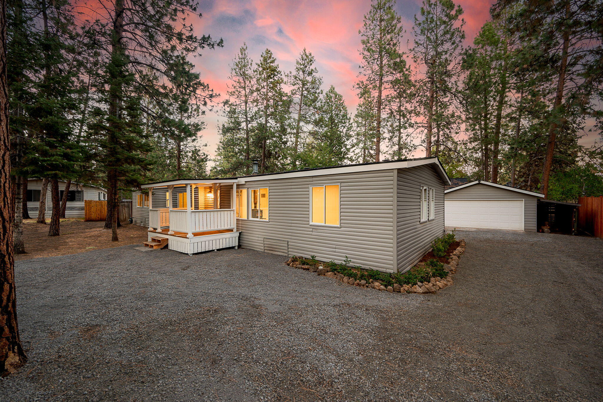 Fully remodeled and move-in ready, this charming manufactured home sits on a spacious and private lot. 

Featuring 3 bedrooms, 2 bathrooms, and nearly 1,900 sq ft of living space, the home blends comfort and function with room to grow. Outside, new roofs on all structures and exterior paint. In the home, new windows, flooring, interior paint, bathroom remodels, and a full kitchen update.

Two detached garages offer plenty of storage, workshop, or hobby space. Enjoy peace and privacy surrounded by trees, with ample outdoor space for entertaining, gardening, or future projects. 

Located just minutes from town, this property offers the perfect balance of seclusion and convenience. A rare find with flexibility, space, and potential!