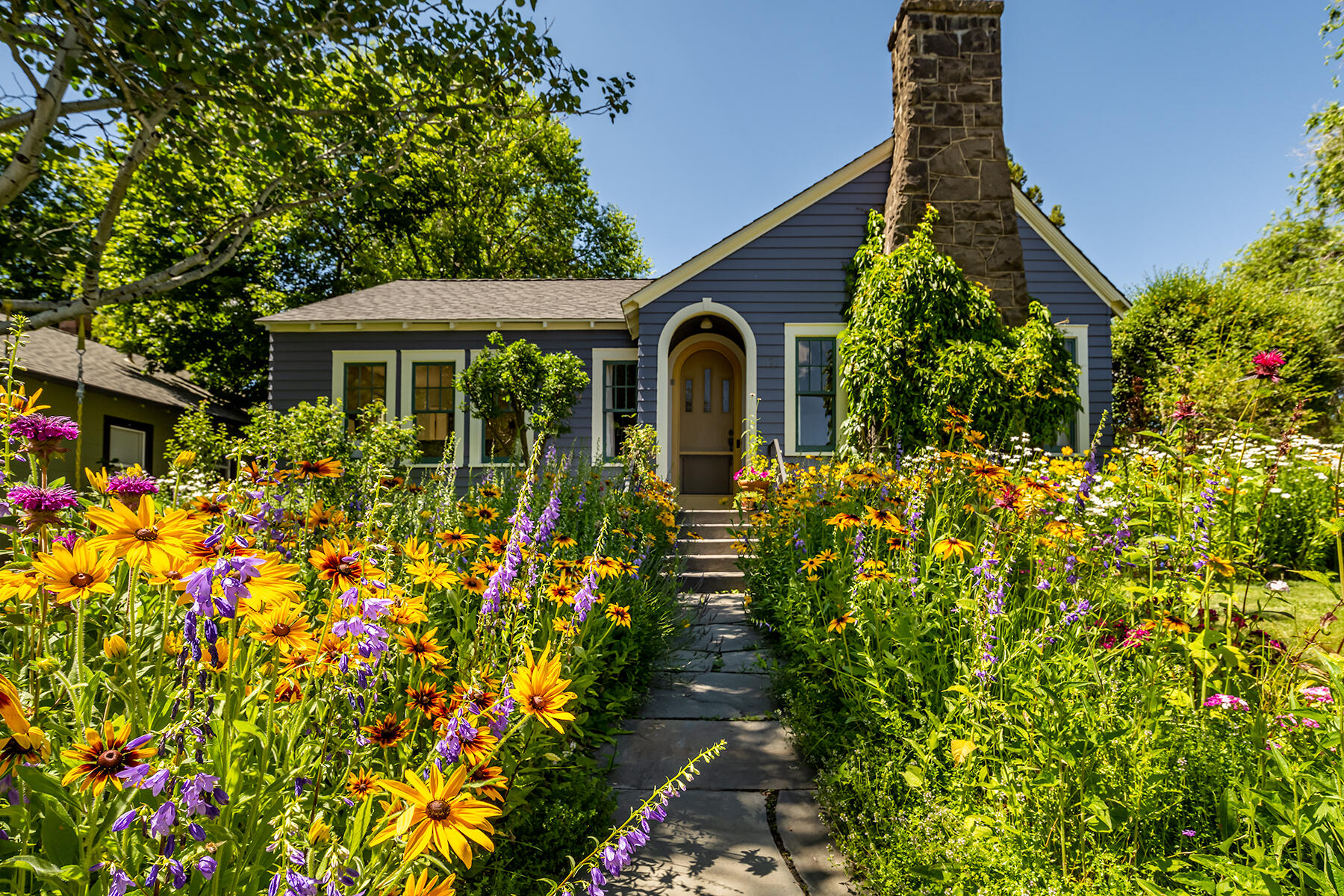 Overlooking Mirror Pond and Harmon Park, this classic home is full of charm in an enviable location in the heart of Westside Bend. Built in 1929 and seamlessly remodeled and upgraded to create a timeless property you will love to call home. A flower-lined flagstone path leads to 1260 square feet full of original character and a 532 square foot dry basement ready to be finished into additional living space or utilized for ample storage. In addition to two comfortable bedrooms, a fully remodeled bathroom and gourmet kitchen, there is a spacious flex/mudroom with work sink. French doors lead to a beautifully landscaped fenced yard featuring a detached art studio or perfect work from home office space and a detached 2-car garage for all of your adventure gear. In the coveted Highland Elementary walking district and steps to the Drake Park footbridge and paddle dock. Walk to downtown, Galveston and Newport corridors for dining, shopping, breweries and concerts. Bend living at its best!