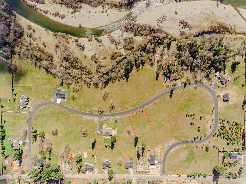 Come build your dream home in a gated community near the Illinois River. Approximately an hour drive to the Oregon coast, minutes away from local hiking trails and Illinois River, and stunning views of mountains that surround the neighborhood. Come enjoy the beautiful scenery and outdoors Cave Junction has to offer.