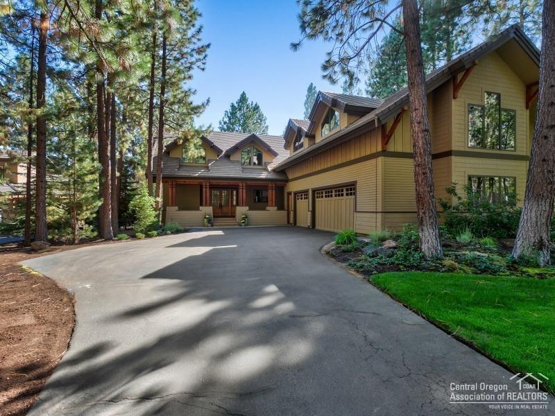 Stunning NW contemporary on a beautifully treed 12th fairway site in Broken Top, Bend's finest gated golf community. The perfect entertainer with a large open great room w/stacked stone fireplace, soaring ceilings & exposed beams. Generous dining area. Gourmet kitchen w/slab counters & in-floor radiant heat. Attractive plan with large, light & bright rooms. Galley style office. Rec room. Media room. Tons of storage, central vac, A/C. Huge tri-car garage w/2 storage areas. Private hot tub.